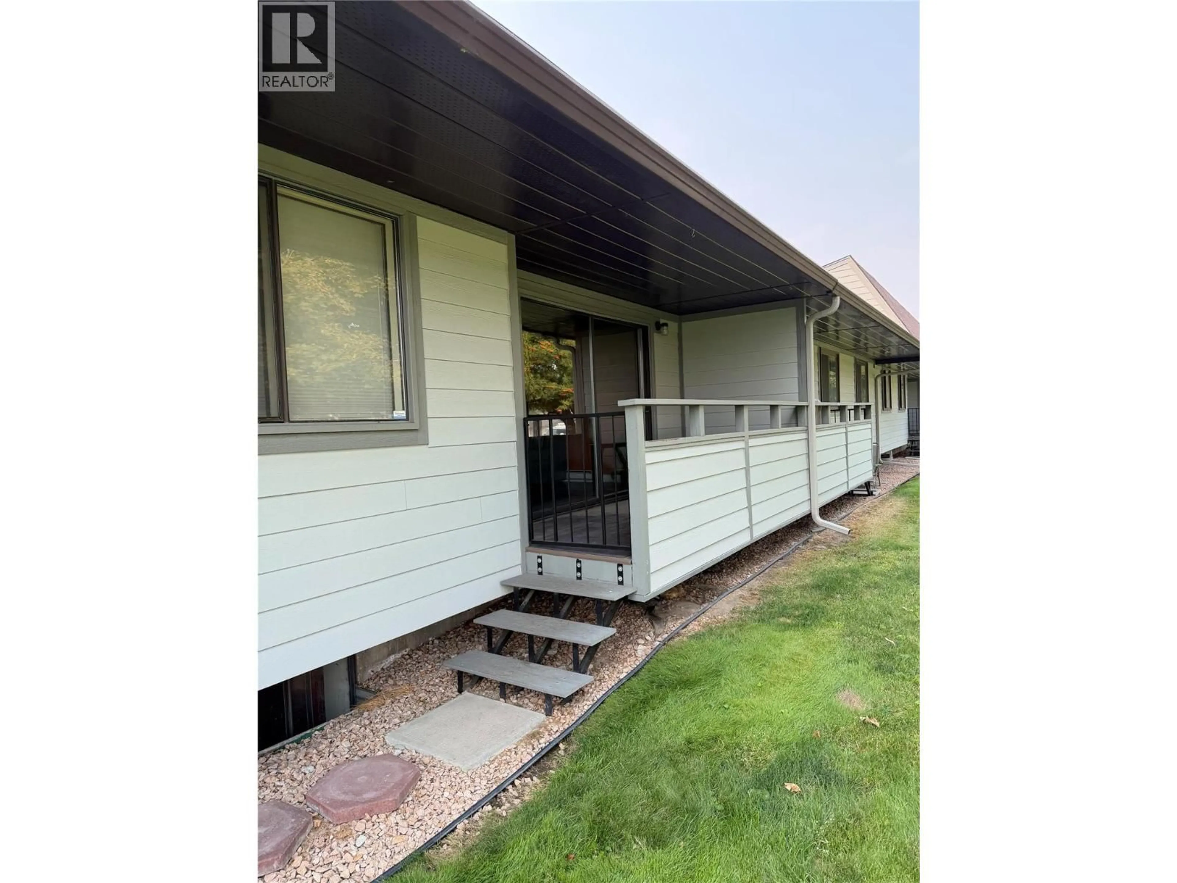 A pic from outside/outdoor area/front of a property/back of a property/a pic from drone, street for 1 - 220 PRIOR ROAD SOUTH, Kelowna British Columbia V1X2Y4