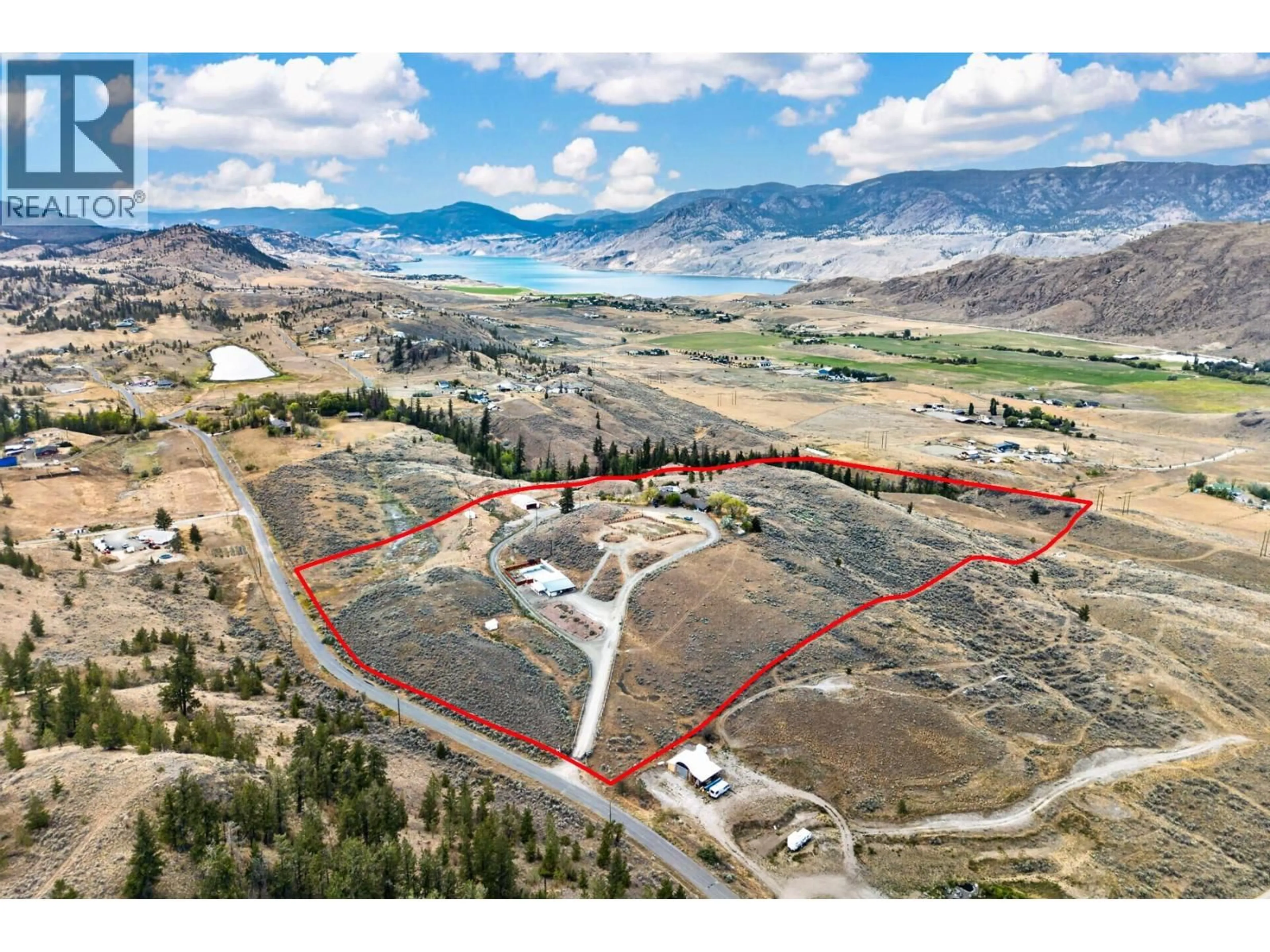 A pic from outside/outdoor area/front of a property/back of a property/a pic from drone, mountain view for 5657 BEATON ROAD, Kamloops British Columbia V1S2A4