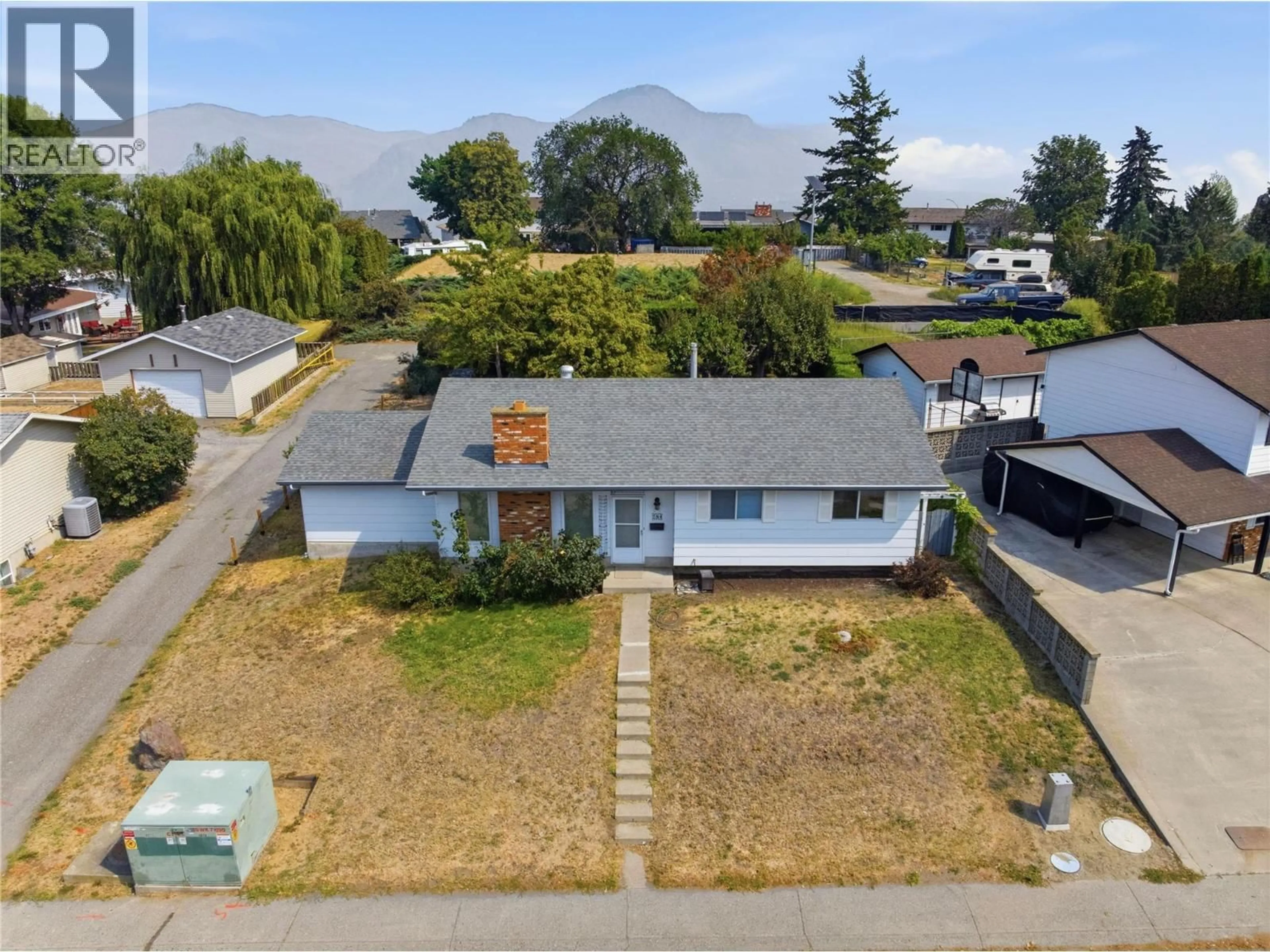 A pic from outside/outdoor area/front of a property/back of a property/a pic from drone, mountain view for 284 ARROWSTONE DRIVE, Kamloops British Columbia V2C1P7