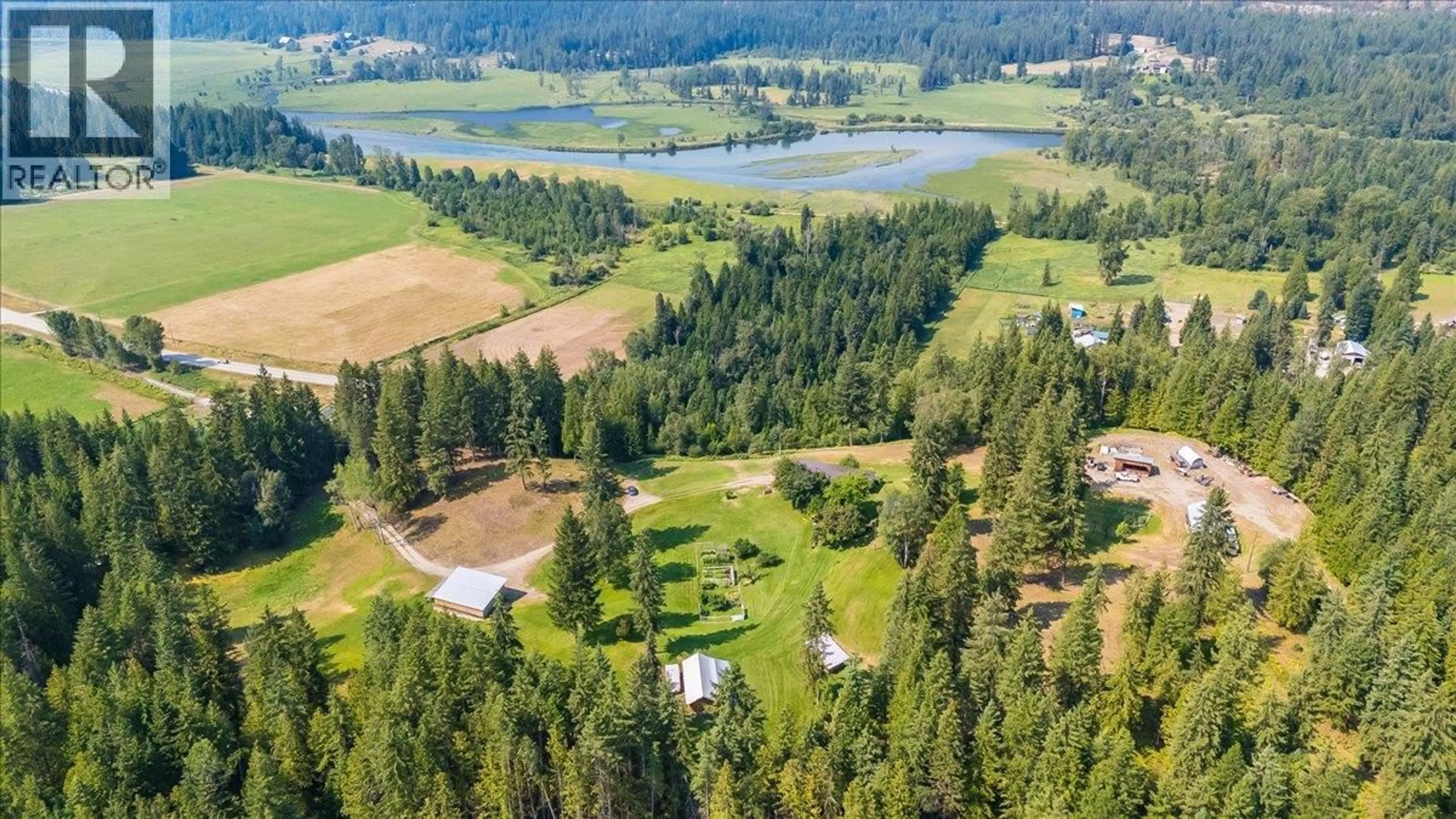 A pic from outside/outdoor area/front of a property/back of a property/a pic from drone, water/lake/river/ocean view for 8716 MARTENS ROAD, Slocan British Columbia V0G2C0