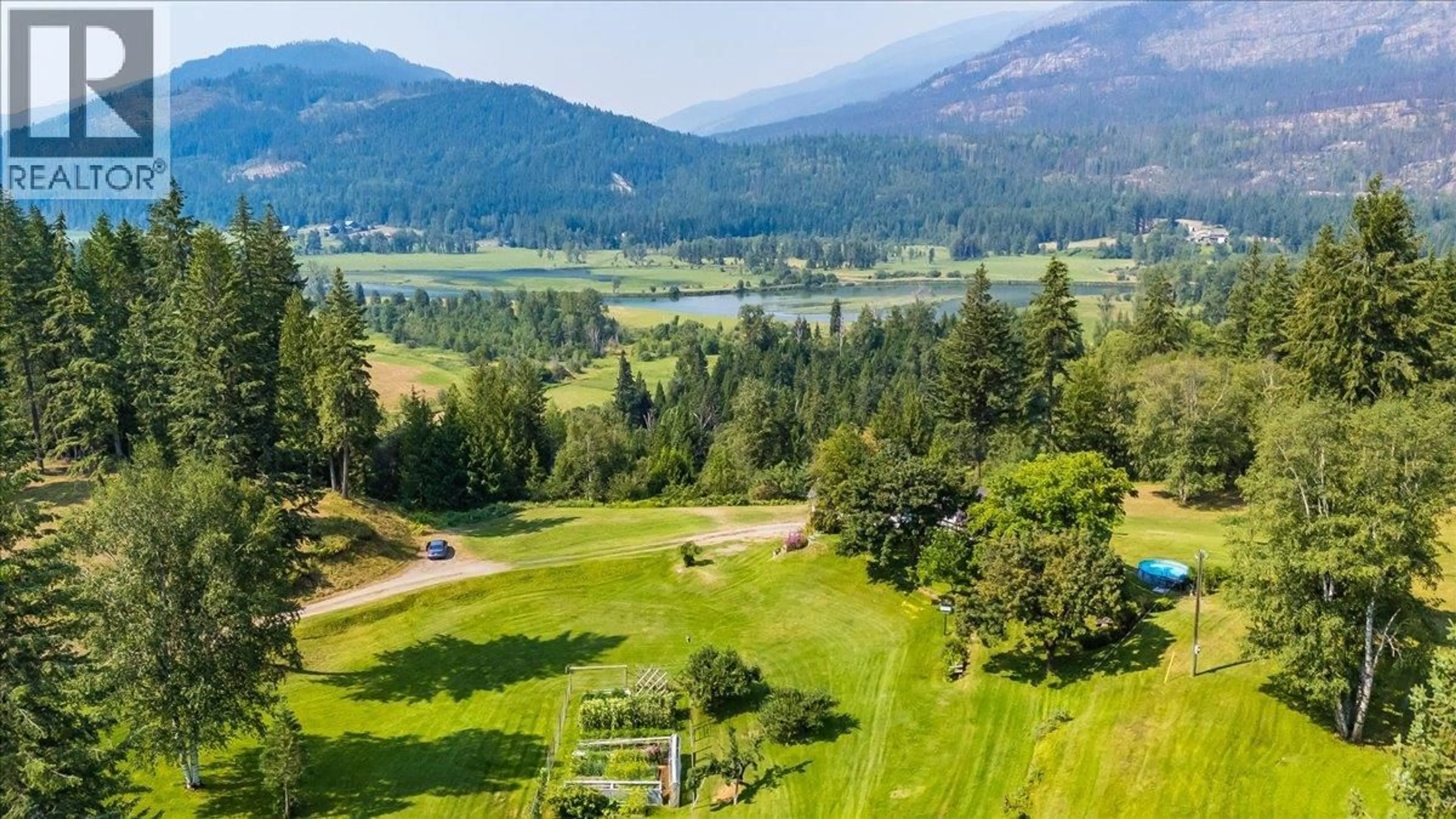 A pic from outside/outdoor area/front of a property/back of a property/a pic from drone, mountain view for 8716 MARTENS ROAD, Slocan British Columbia V0G2C0