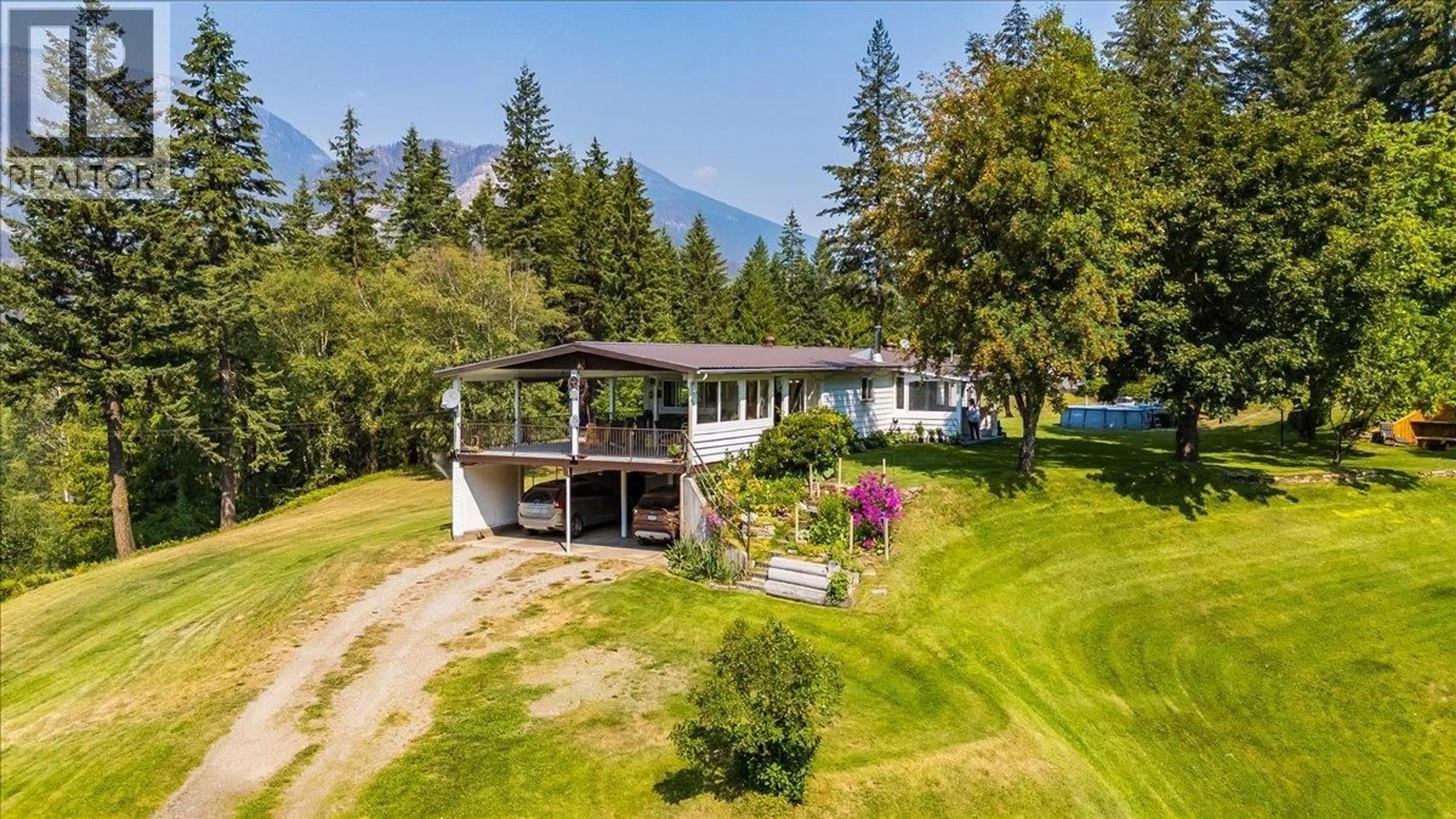 A pic from outside/outdoor area/front of a property/back of a property/a pic from drone, mountain view for 8716 MARTENS ROAD, Slocan British Columbia V0G2C0