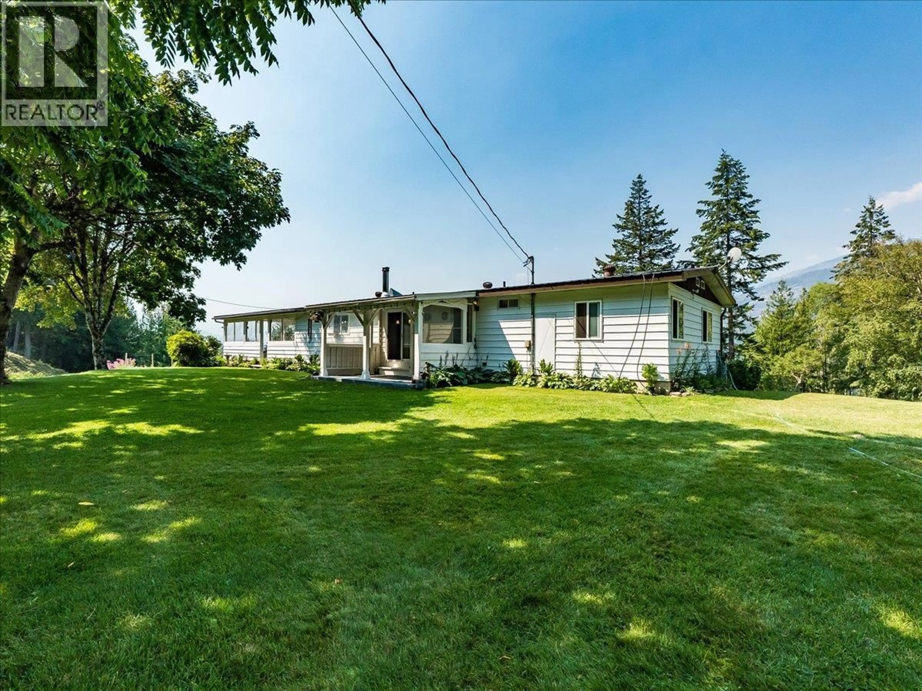 A pic from outside/outdoor area/front of a property/back of a property/a pic from drone, unknown for 8716 MARTENS ROAD, Slocan British Columbia V0G2C0