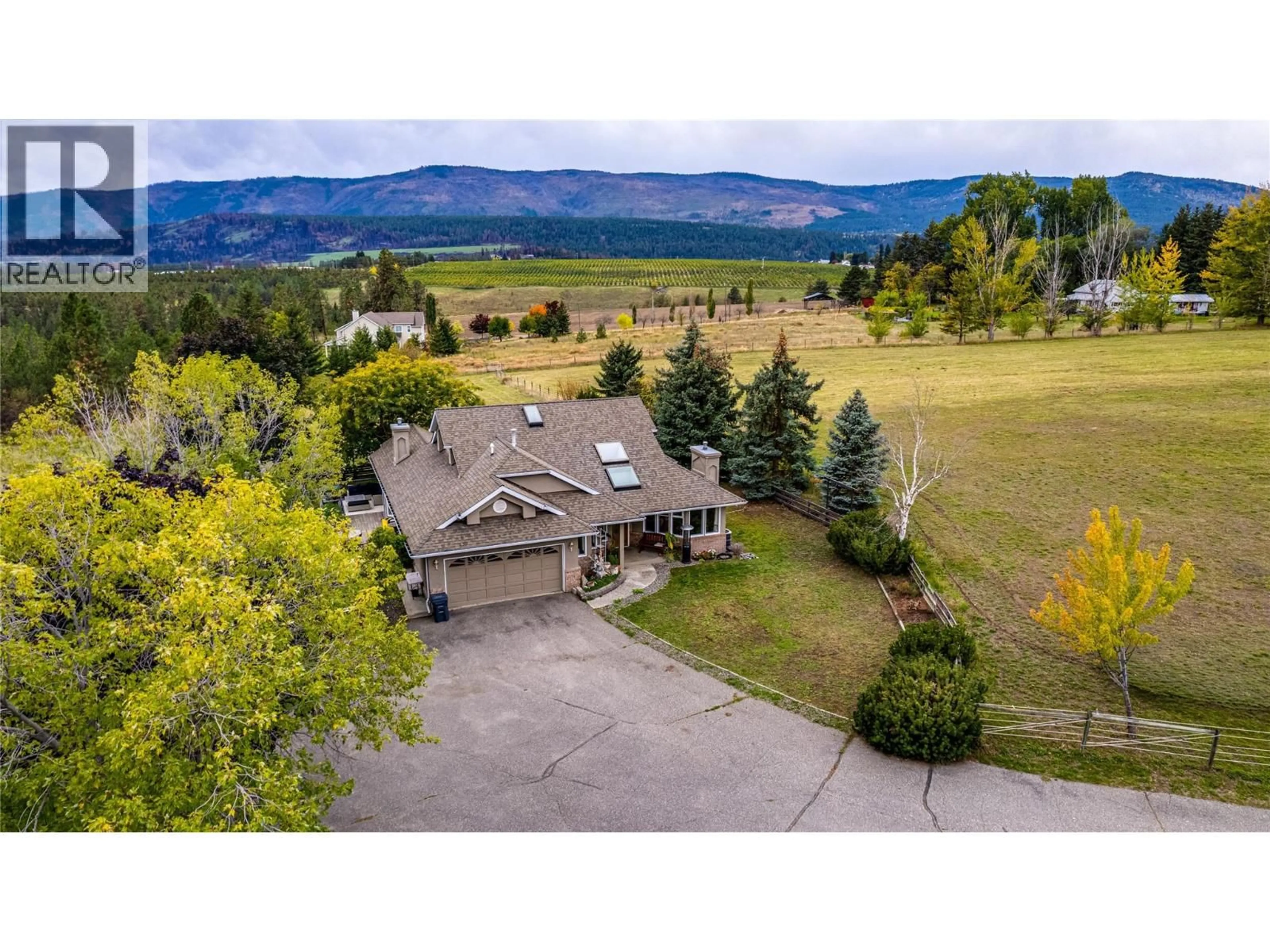 A pic from outside/outdoor area/front of a property/back of a property/a pic from drone, mountain view for 4671 GRANDVIEW FLATS ROAD SOUTH, Spallumcheen British Columbia V4Y0P6