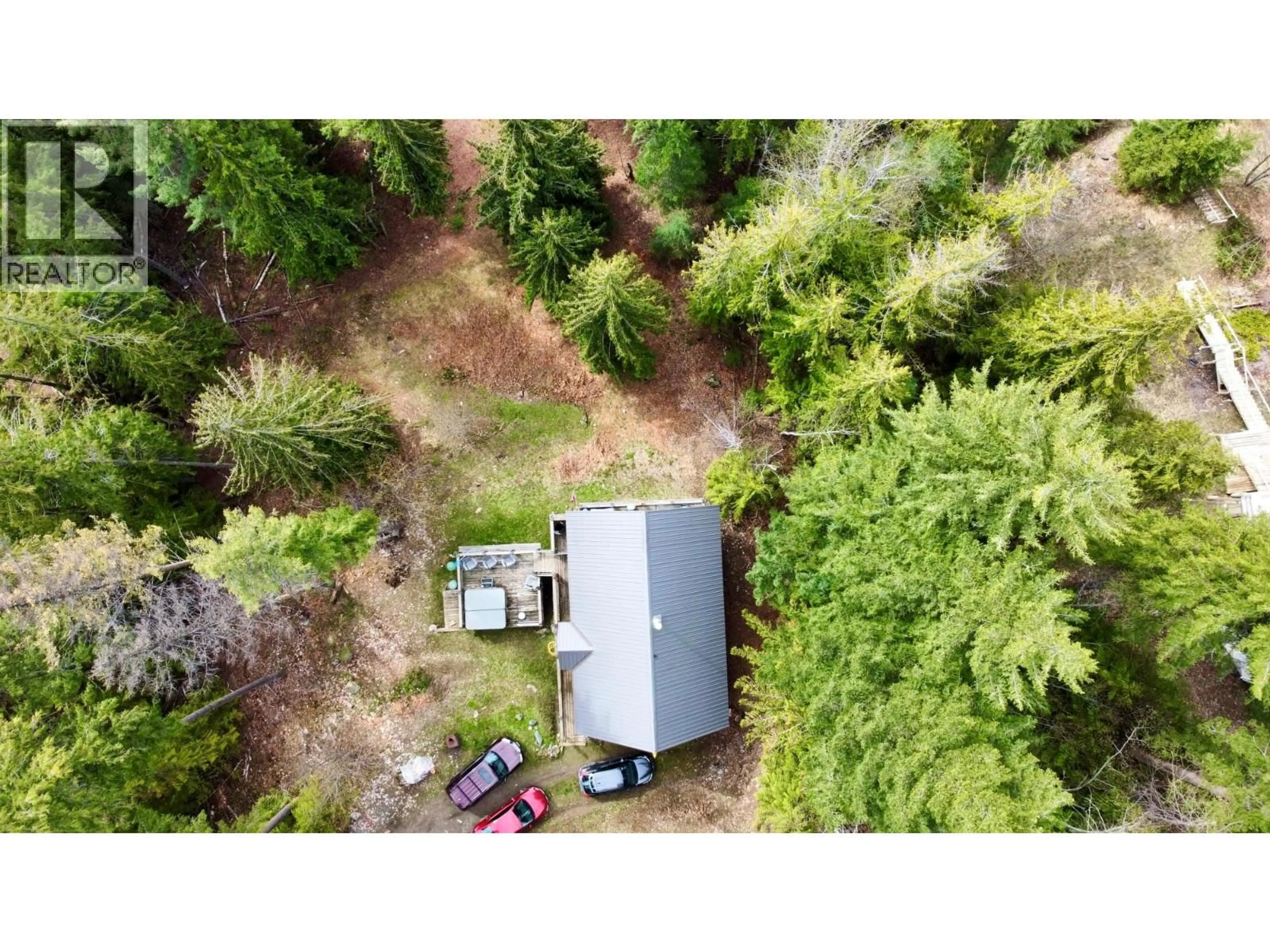 A pic from outside/outdoor area/front of a property/back of a property/a pic from drone, forest/trees view for 3000 VICKERS TRAIL, Anglemont British Columbia V0E1M8