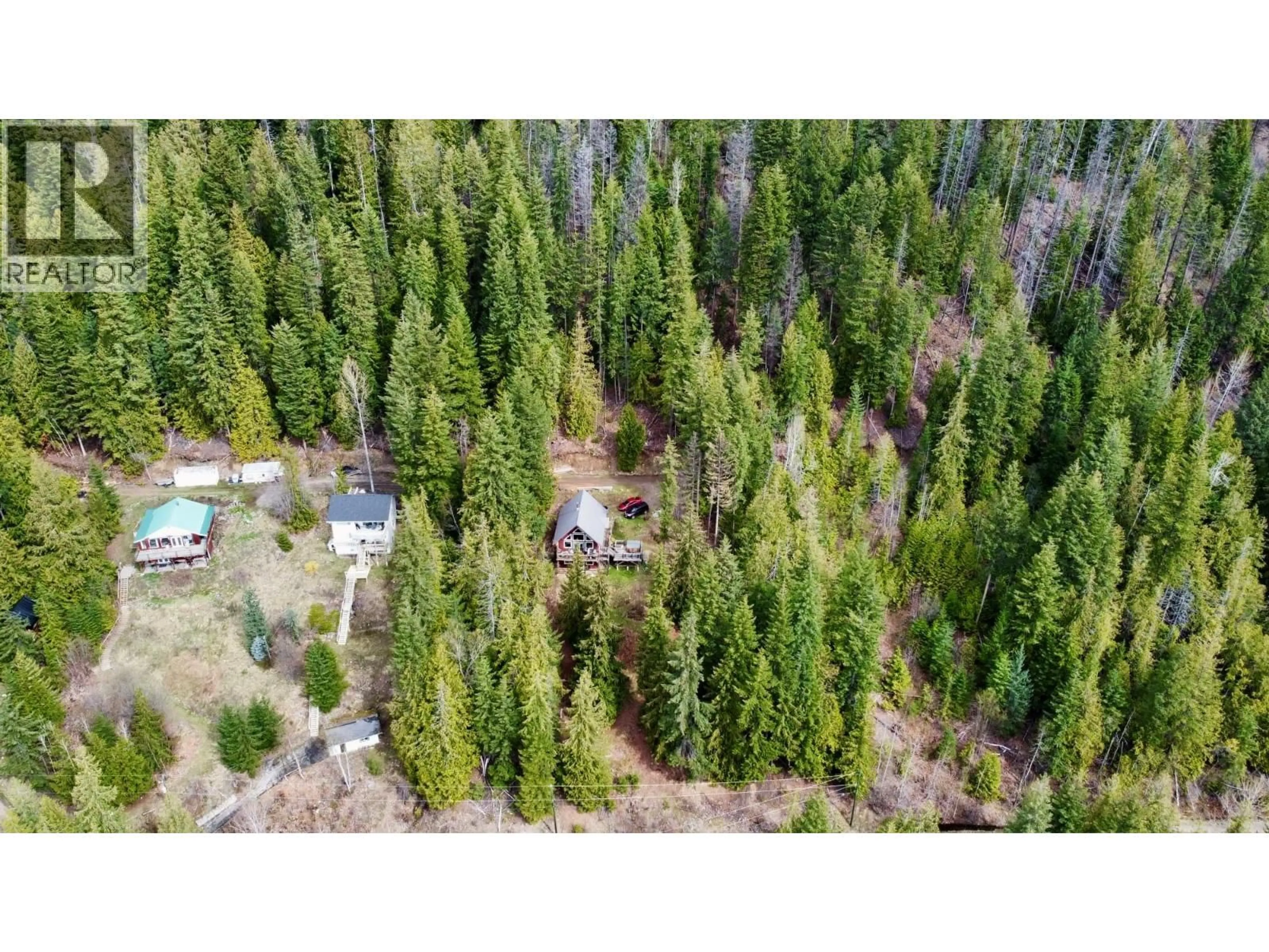 A pic from outside/outdoor area/front of a property/back of a property/a pic from drone, forest/trees view for 3000 VICKERS TRAIL, Anglemont British Columbia V0E1M8