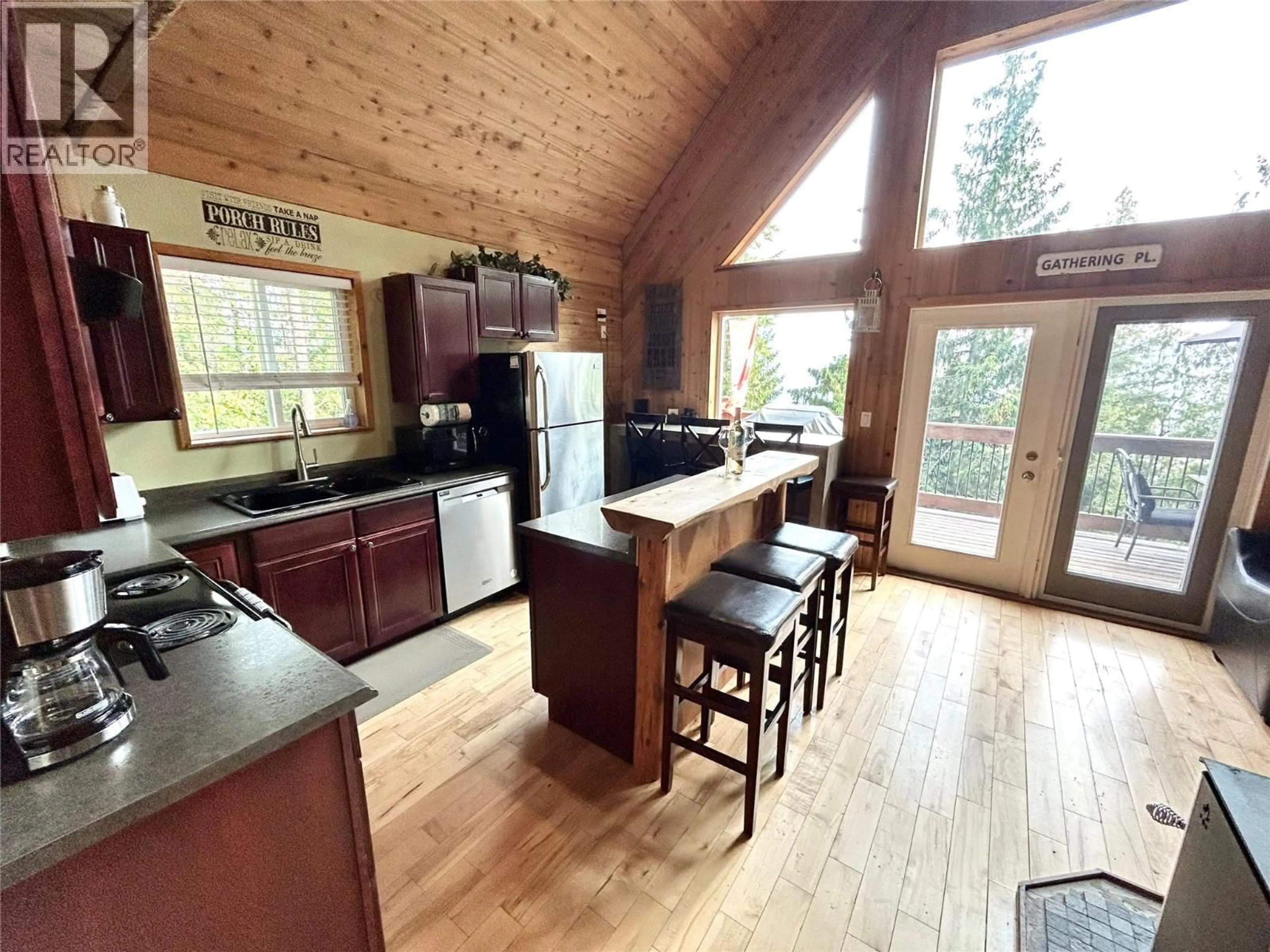Open concept kitchen, wood/laminate floor for 3000 VICKERS TRAIL, Anglemont British Columbia V0E1M8