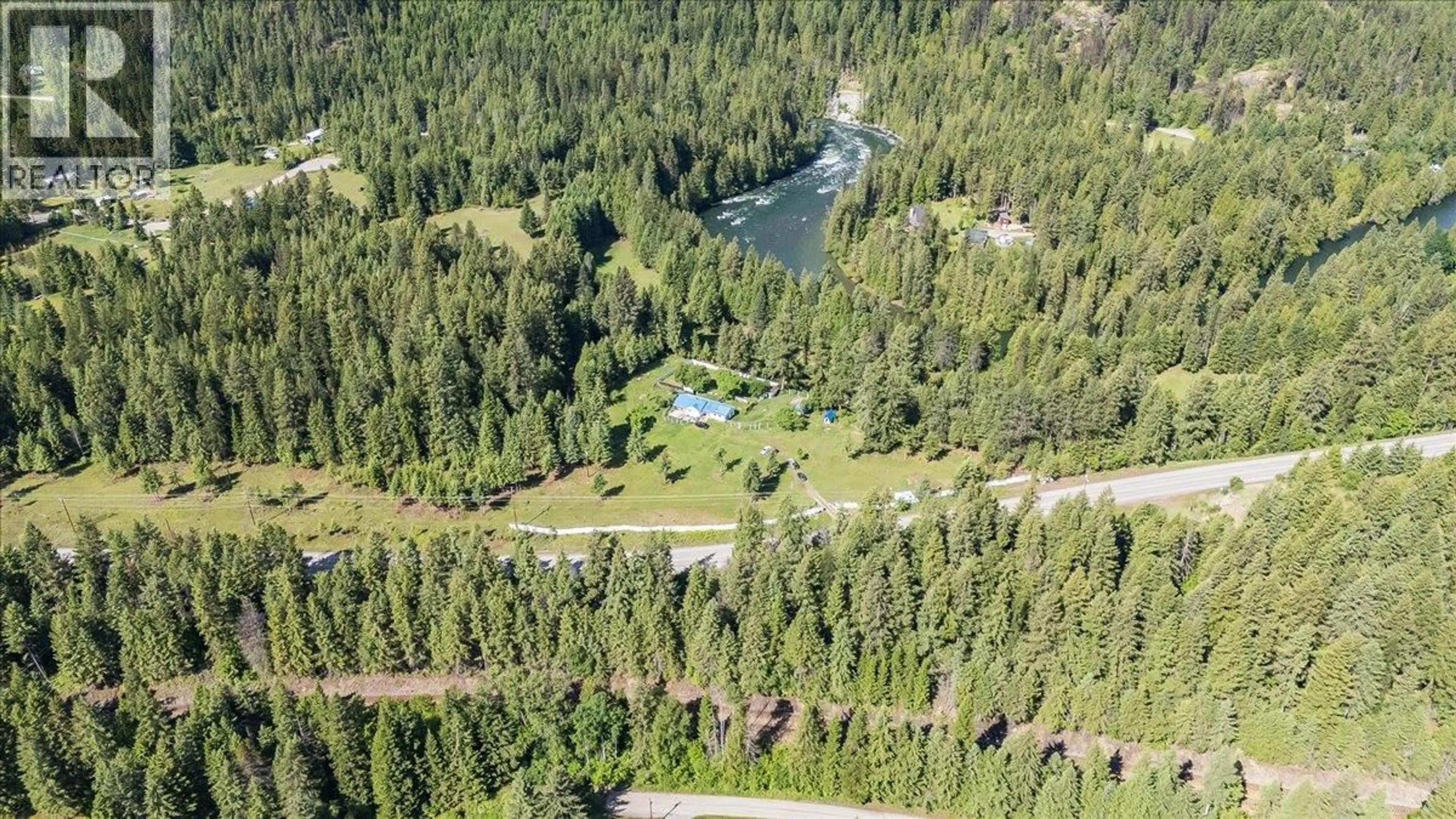 A pic from outside/outdoor area/front of a property/back of a property/a pic from drone, forest/trees view for 2621 3A HIGHWAY, Castlegar British Columbia V1N4P5