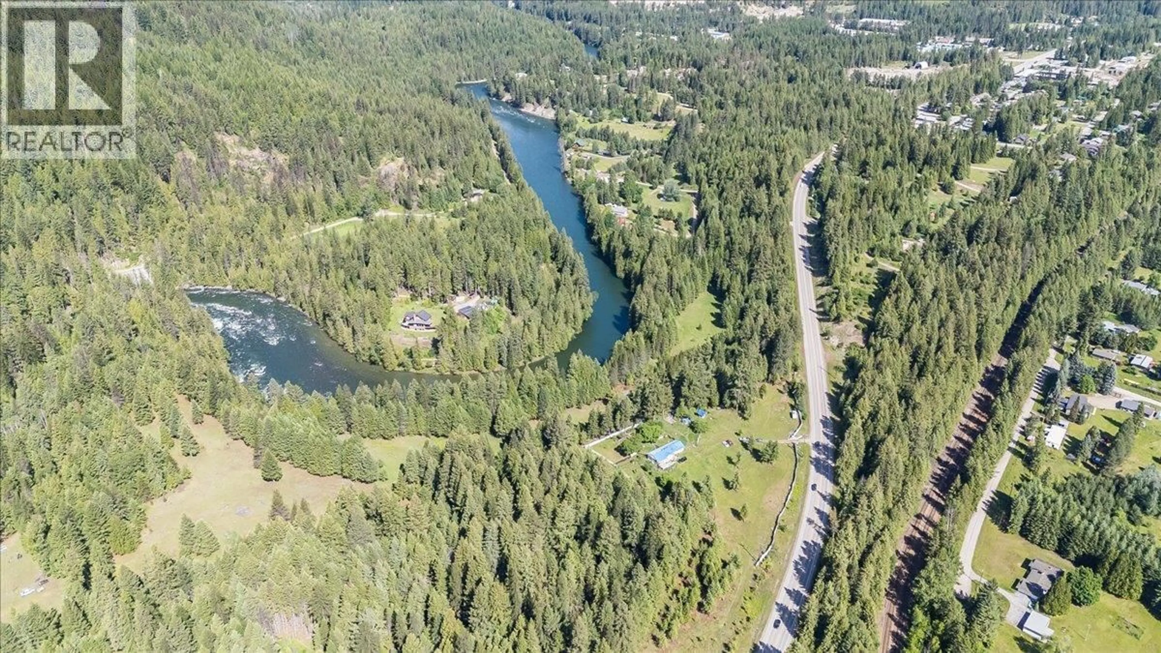 A pic from outside/outdoor area/front of a property/back of a property/a pic from drone, water/lake/river/ocean view for 2621 3A HIGHWAY, Castlegar British Columbia V1N4P5