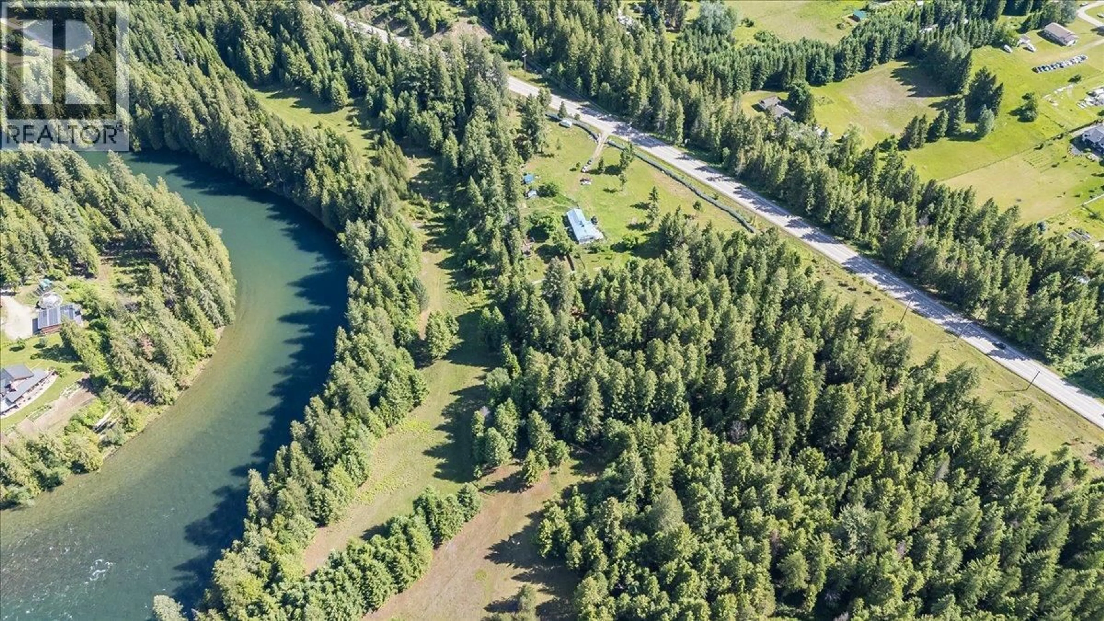A pic from outside/outdoor area/front of a property/back of a property/a pic from drone, water/lake/river/ocean view for 2621 3A HIGHWAY, Castlegar British Columbia V1N4P5