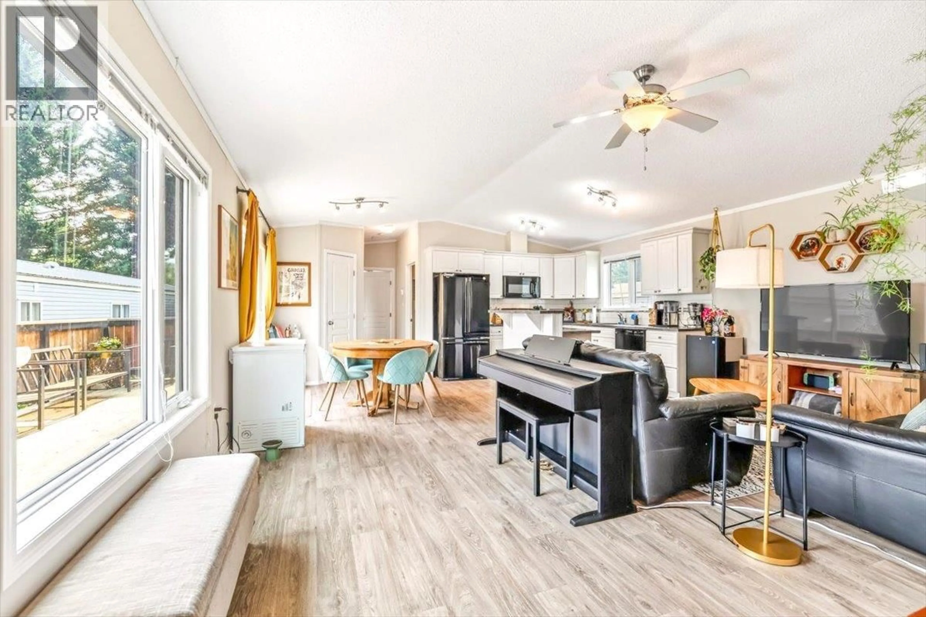Open concept kitchen, wood/laminate floor for C10 - 60 COKATO ROAD, Fernie British Columbia V0B1M4
