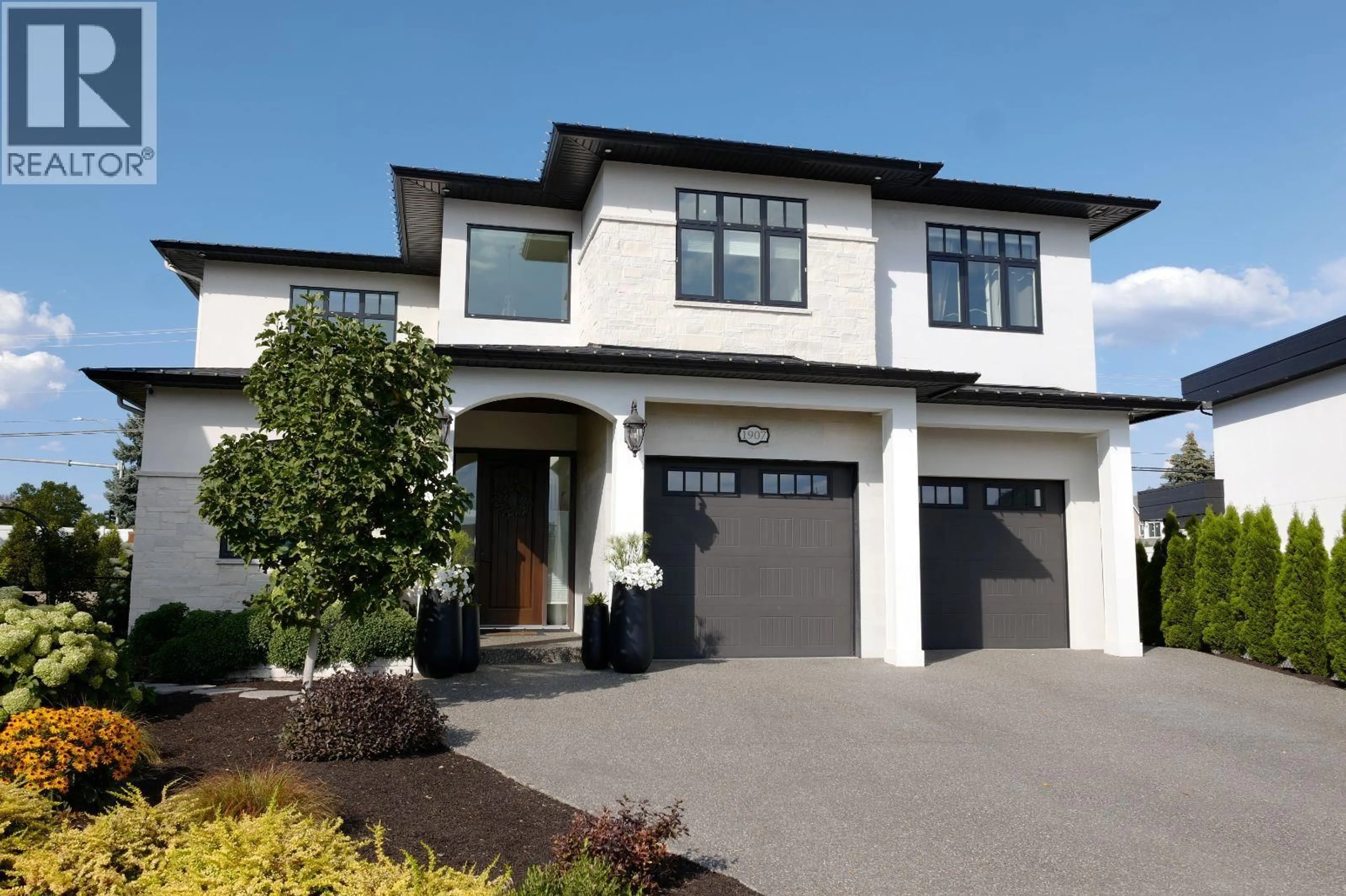 Home with brick exterior material, street for 1907 HEMMERLING COURT, Kelowna British Columbia V1V1X1
