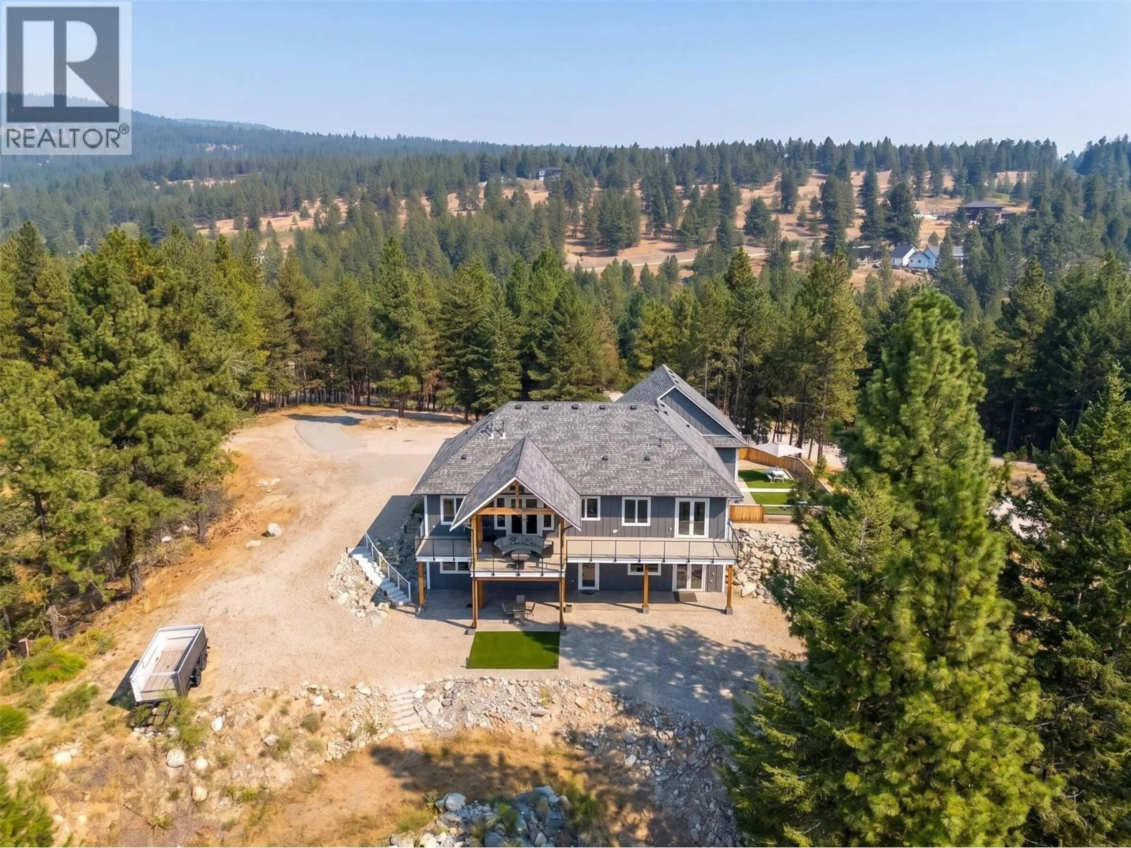 A pic from outside/outdoor area/front of a property/back of a property/a pic from drone, mountain view for 125 FALCON PLACE, Osoyoos British Columbia V0H1V6
