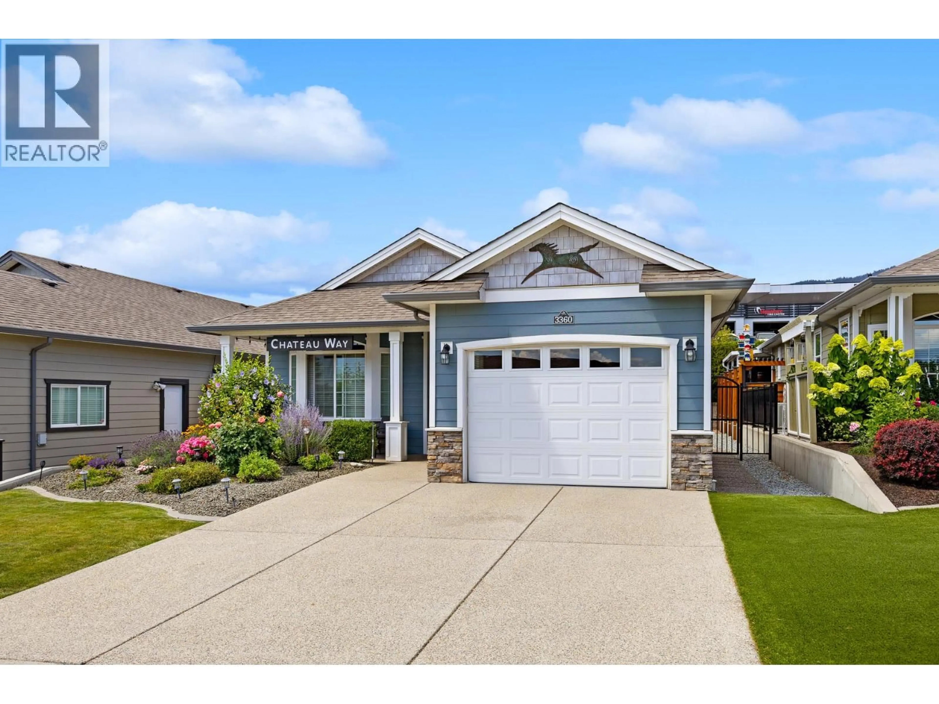 Home with vinyl exterior material, street for 3360 MIMOSA DRIVE, West Kelowna British Columbia V4T3A5
