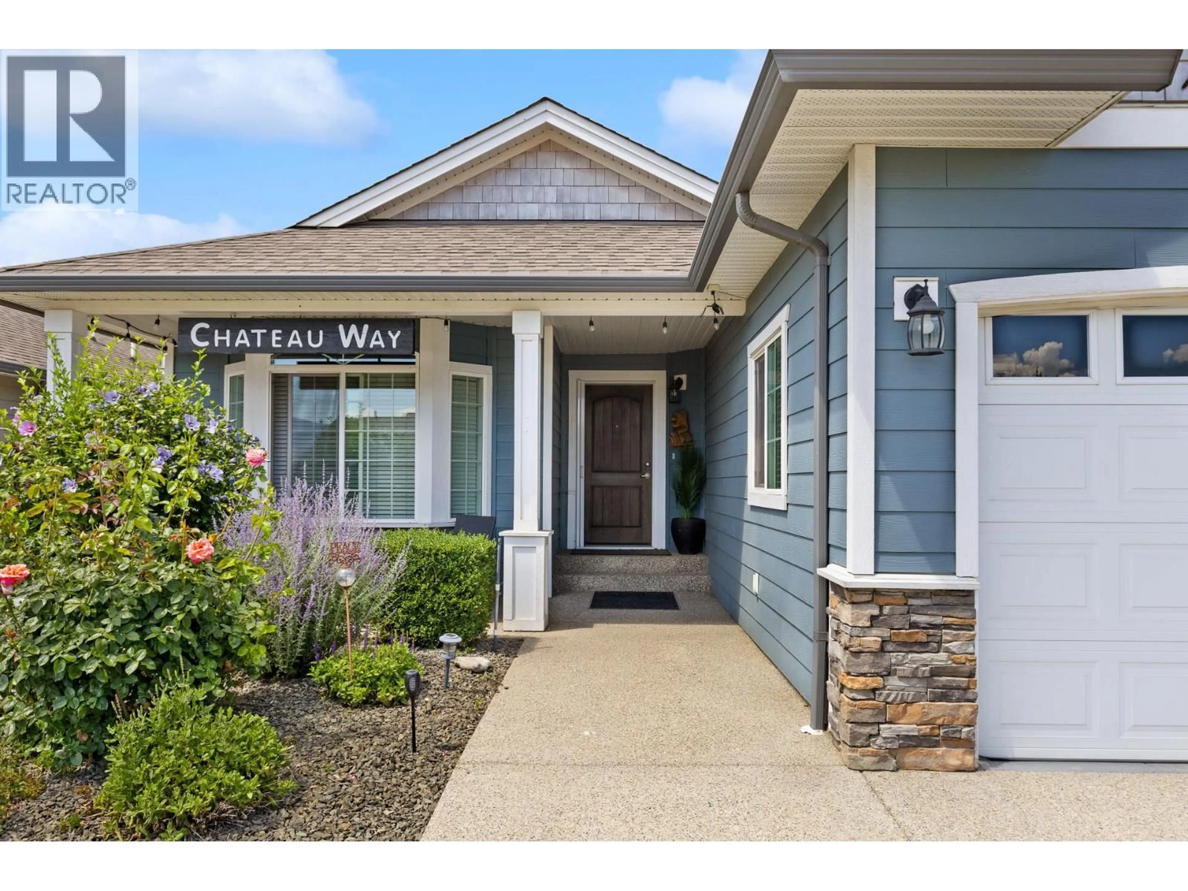 Home with vinyl exterior material, street for 3360 MIMOSA DRIVE, West Kelowna British Columbia V4T3A5