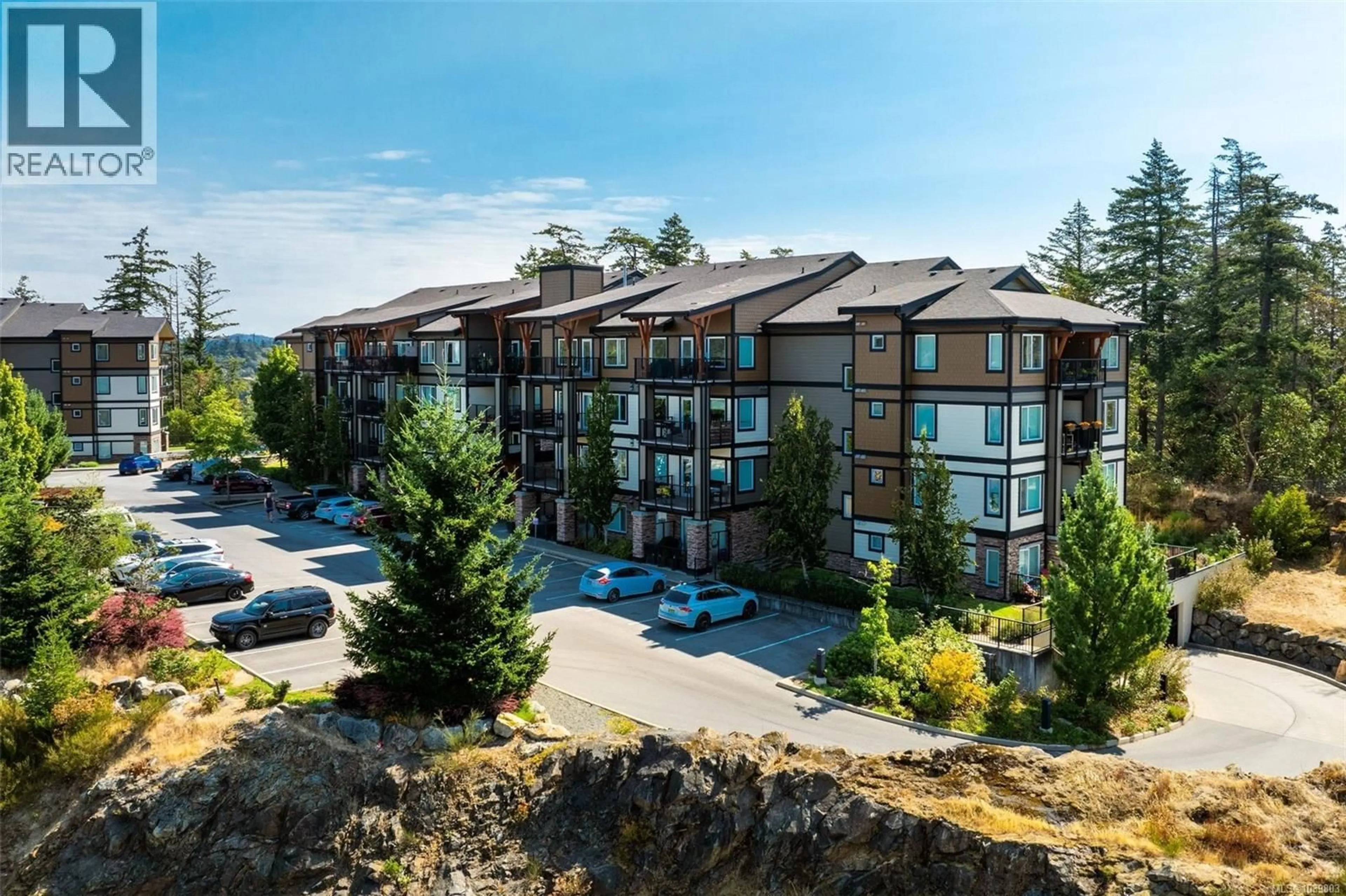 A pic from outside/outdoor area/front of a property/back of a property/a pic from drone, mountain view for 310 - 286 WILFERT ROAD, View Royal British Columbia V9C0H6