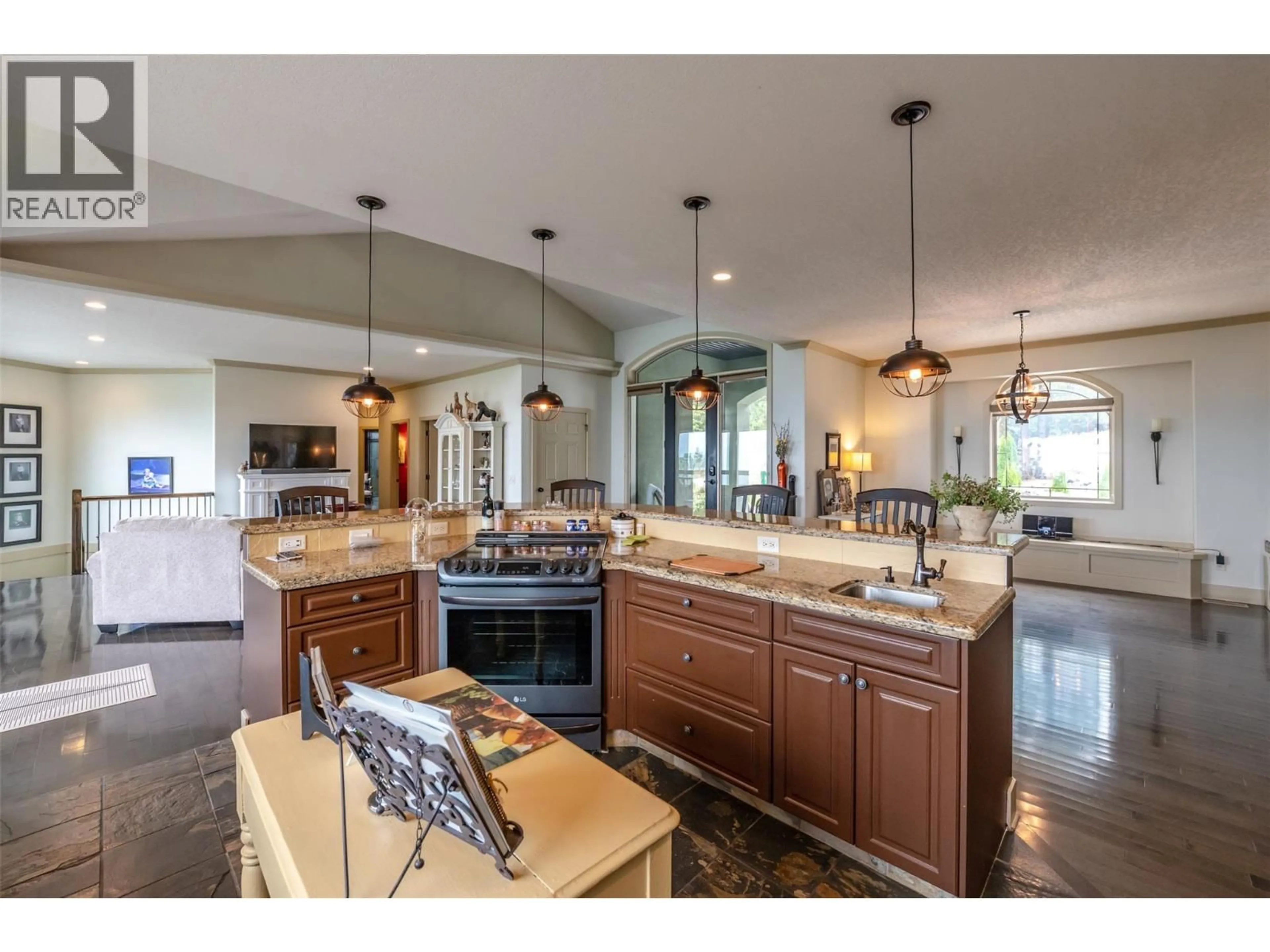 Open concept kitchen, ceramic/tile floor for 180 PEREGRINE COURT, Osoyoos British Columbia V0H1V6
