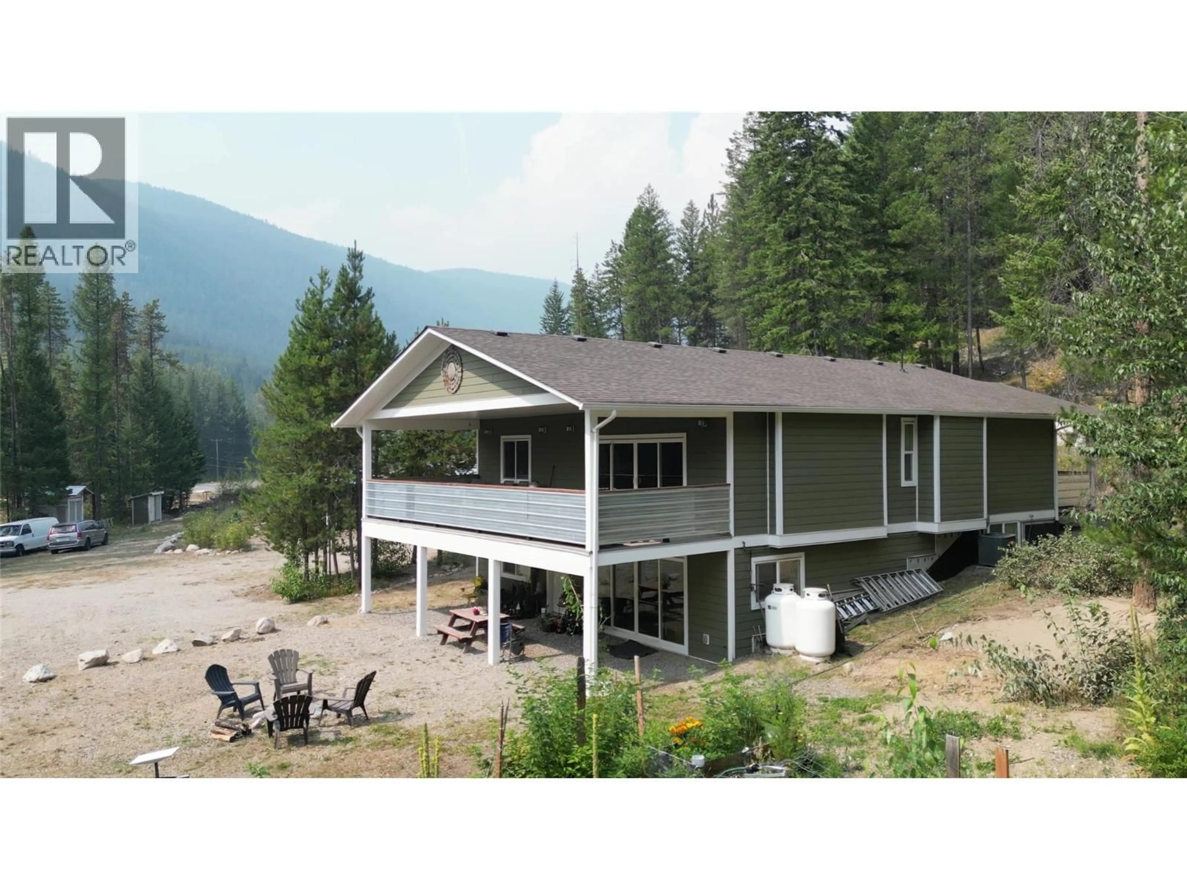A pic from outside/outdoor area/front of a property/back of a property/a pic from drone, mountain view for 4820 HIGHWAY 33 OTHER, Beaverdell British Columbia V0H1A0