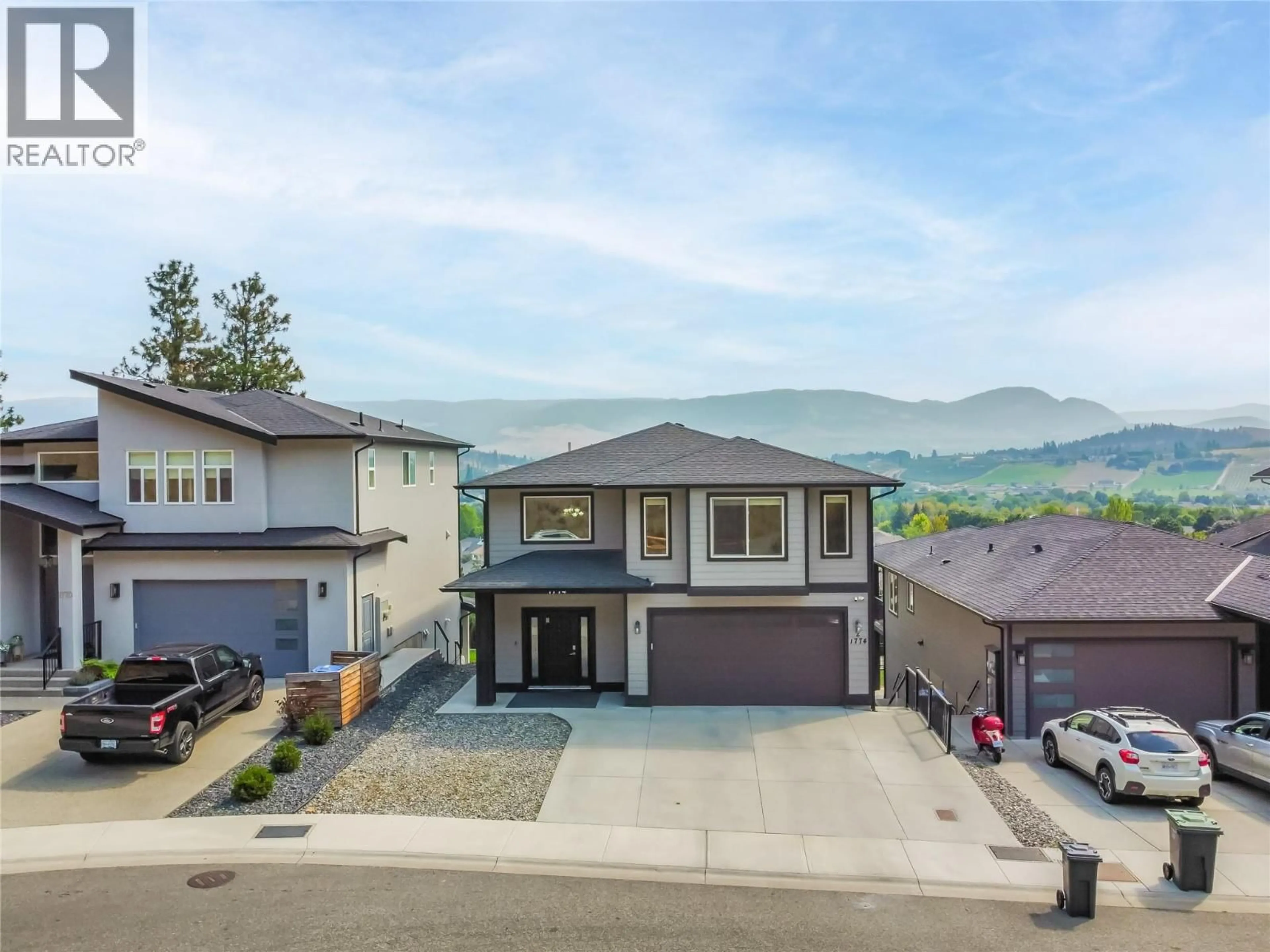 A pic from outside/outdoor area/front of a property/back of a property/a pic from drone, mountain view for 1774 CROSBY ROAD, Kelowna British Columbia V1V3G5