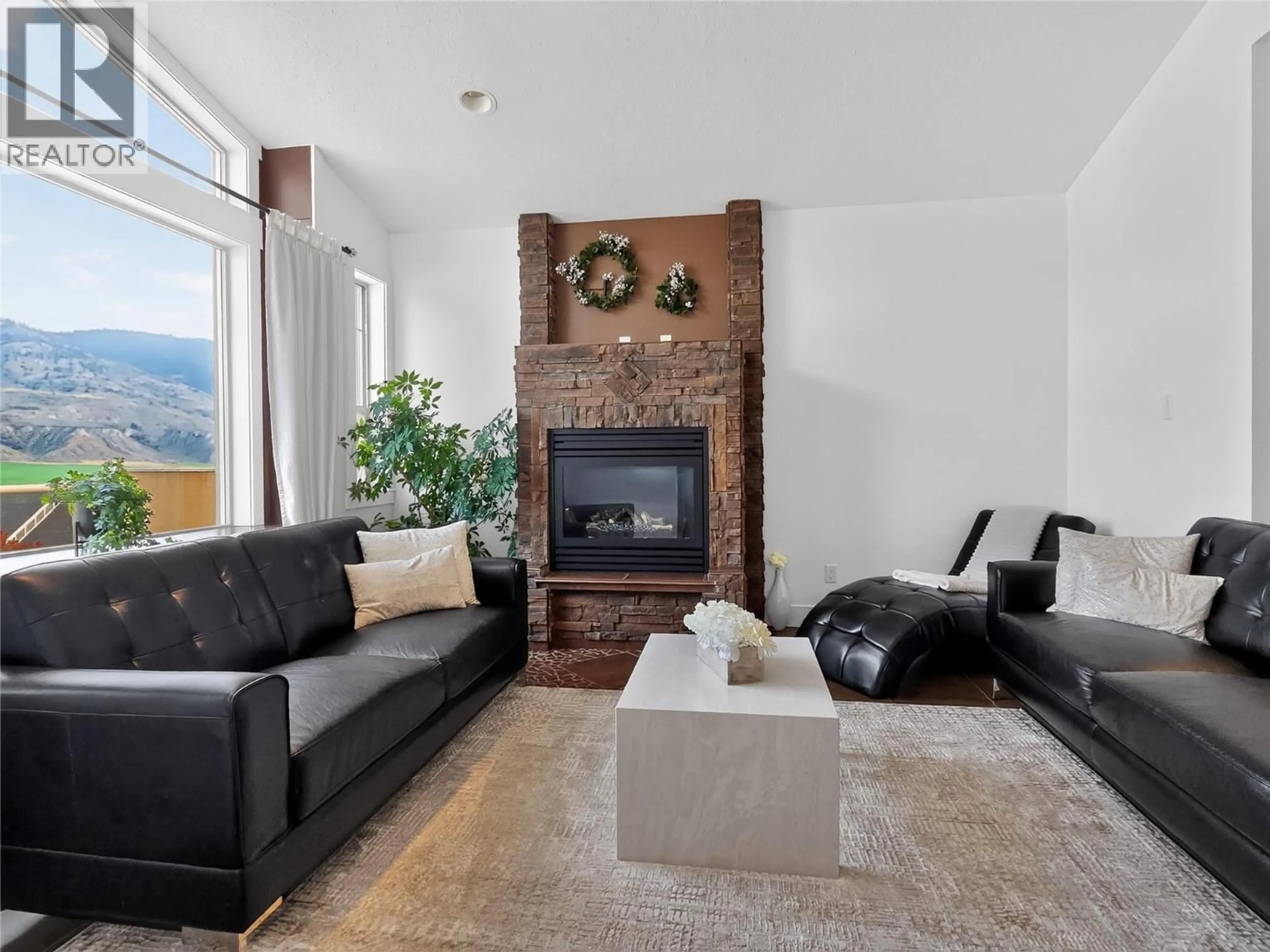 Living room with furniture, ceramic/tile floor for 8723 BADGER DRIVE, Kamloops British Columbia V2C0B2