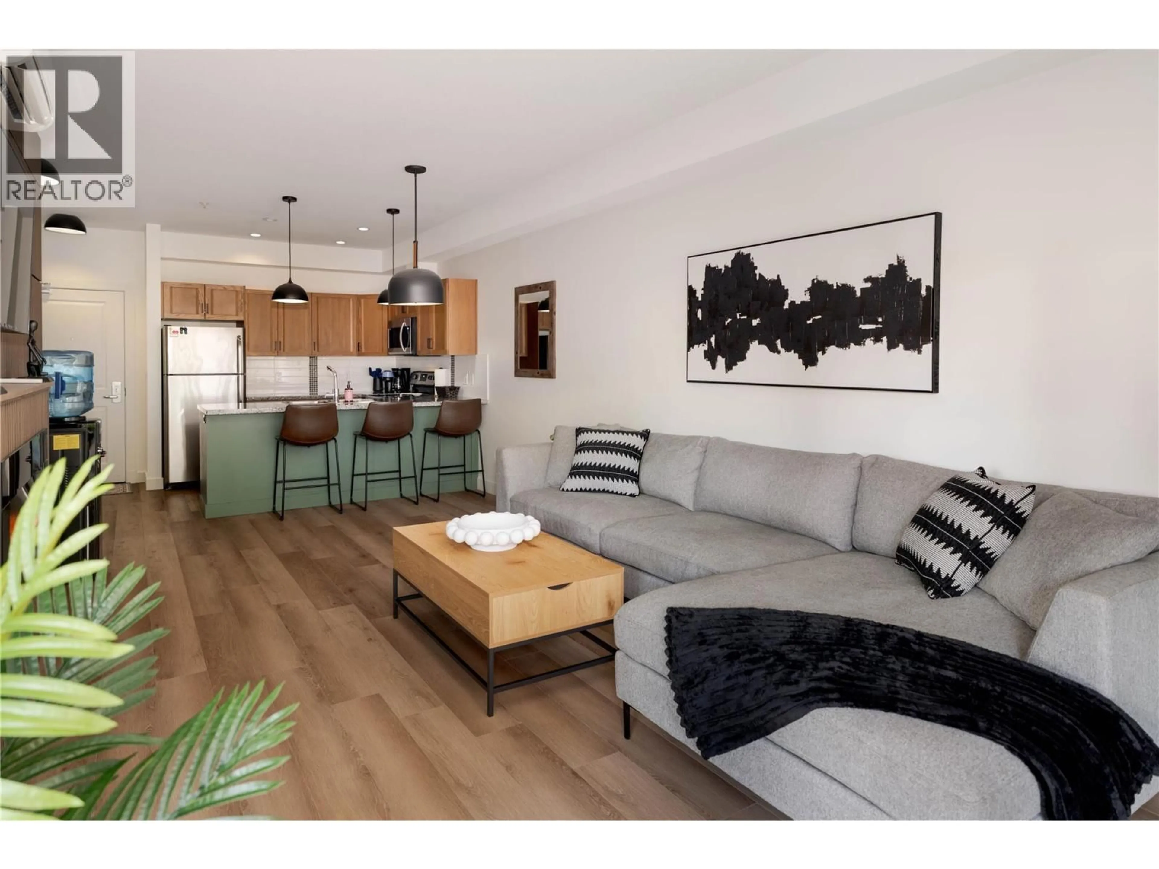 Living room with furniture, wood/laminate floor for 208 - 3229 SKYVIEW LANE, West Kelowna British Columbia V4T3J3
