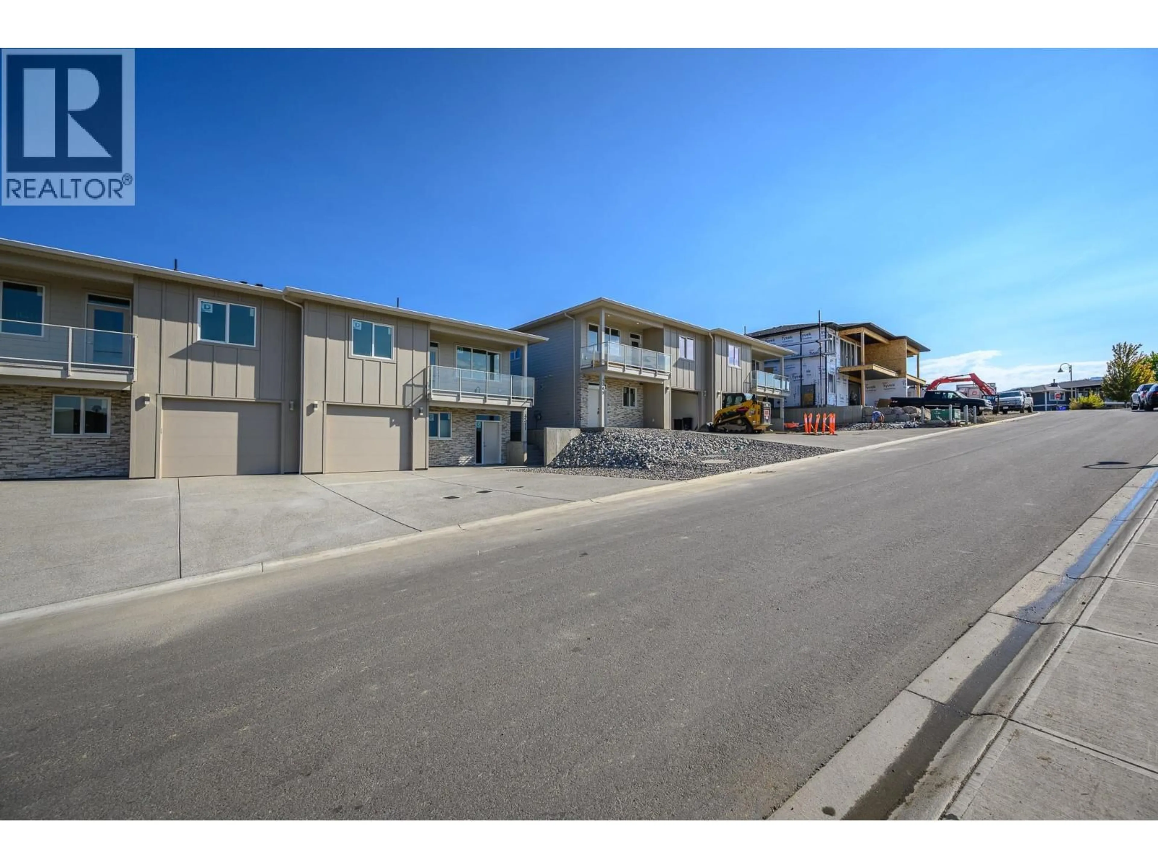 A pic from outside/outdoor area/front of a property/back of a property/a pic from drone, street for 4311 PAINTED TURTLE DRIVE, Vernon British Columbia V1H1A2