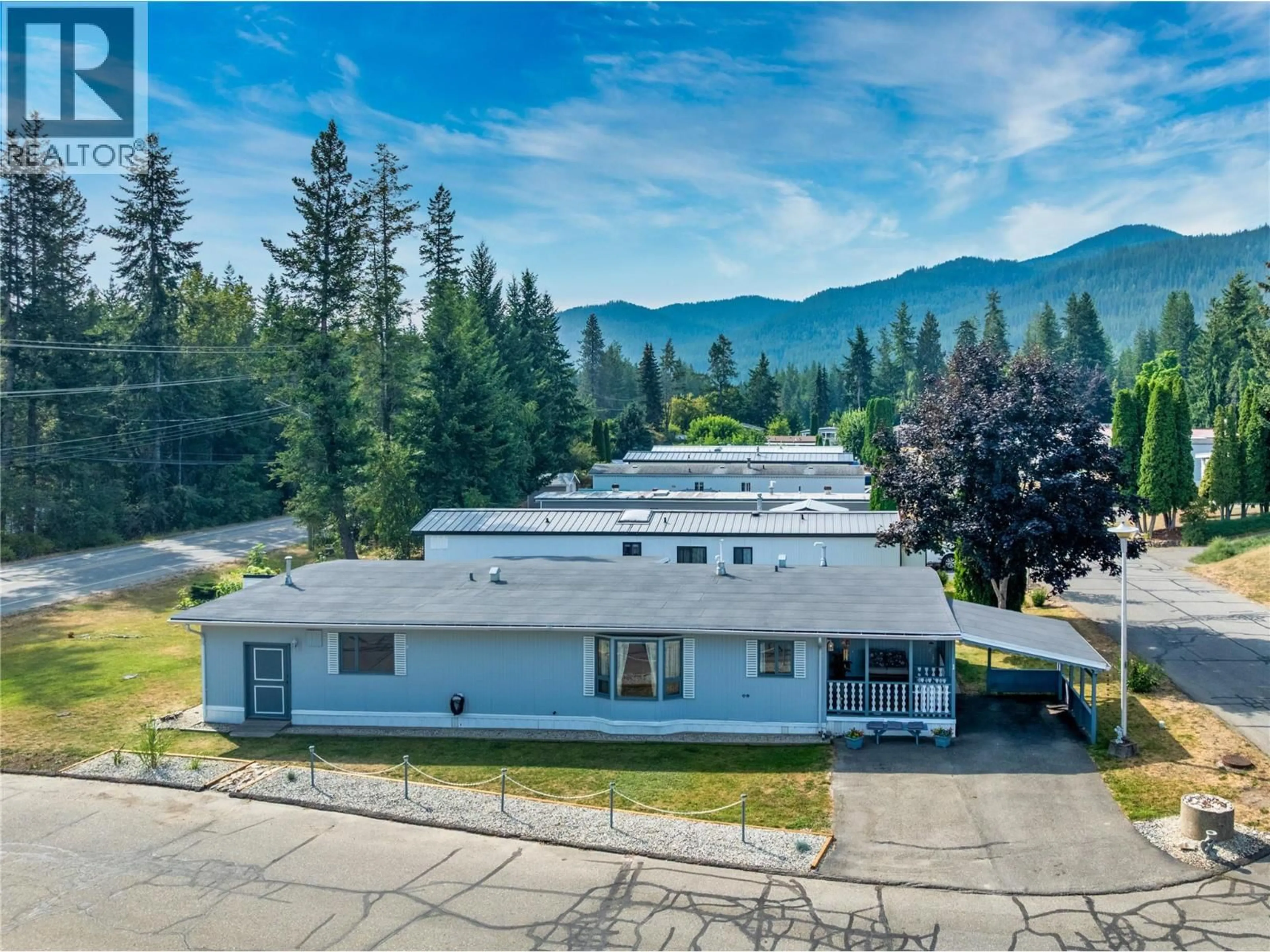 A pic from outside/outdoor area/front of a property/back of a property/a pic from drone, mountain view for 1 - 1361 30 STREET SOUTHEAST, Salmon Arm British Columbia V1E2N4