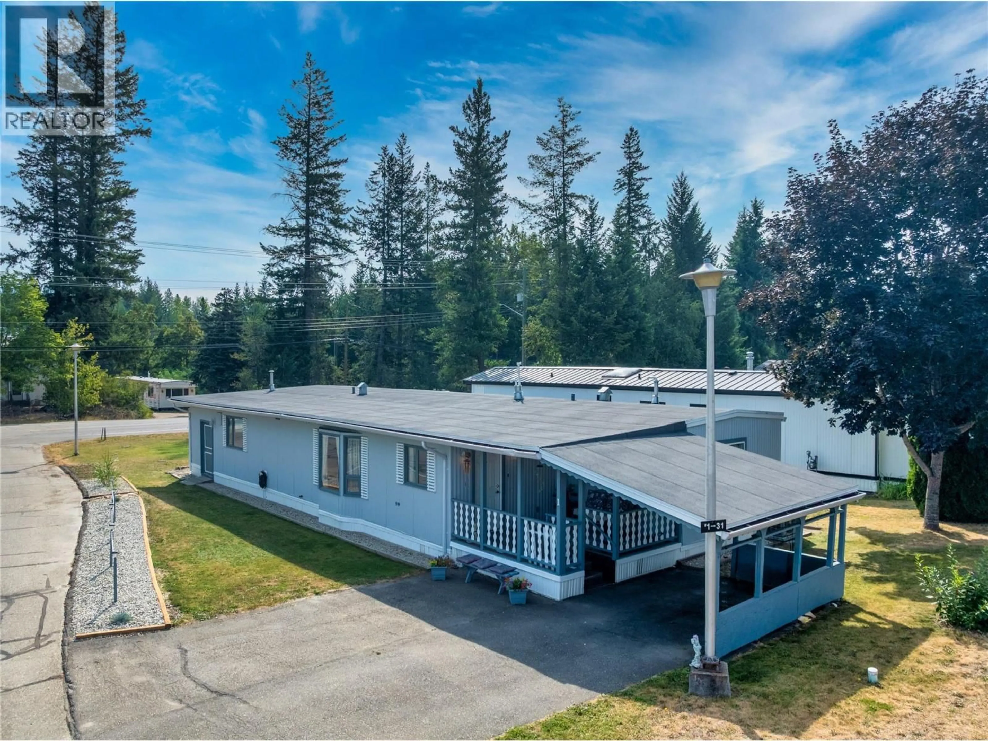 A pic from outside/outdoor area/front of a property/back of a property/a pic from drone, building for 1 - 1361 30 STREET SOUTHEAST, Salmon Arm British Columbia V1E2N4