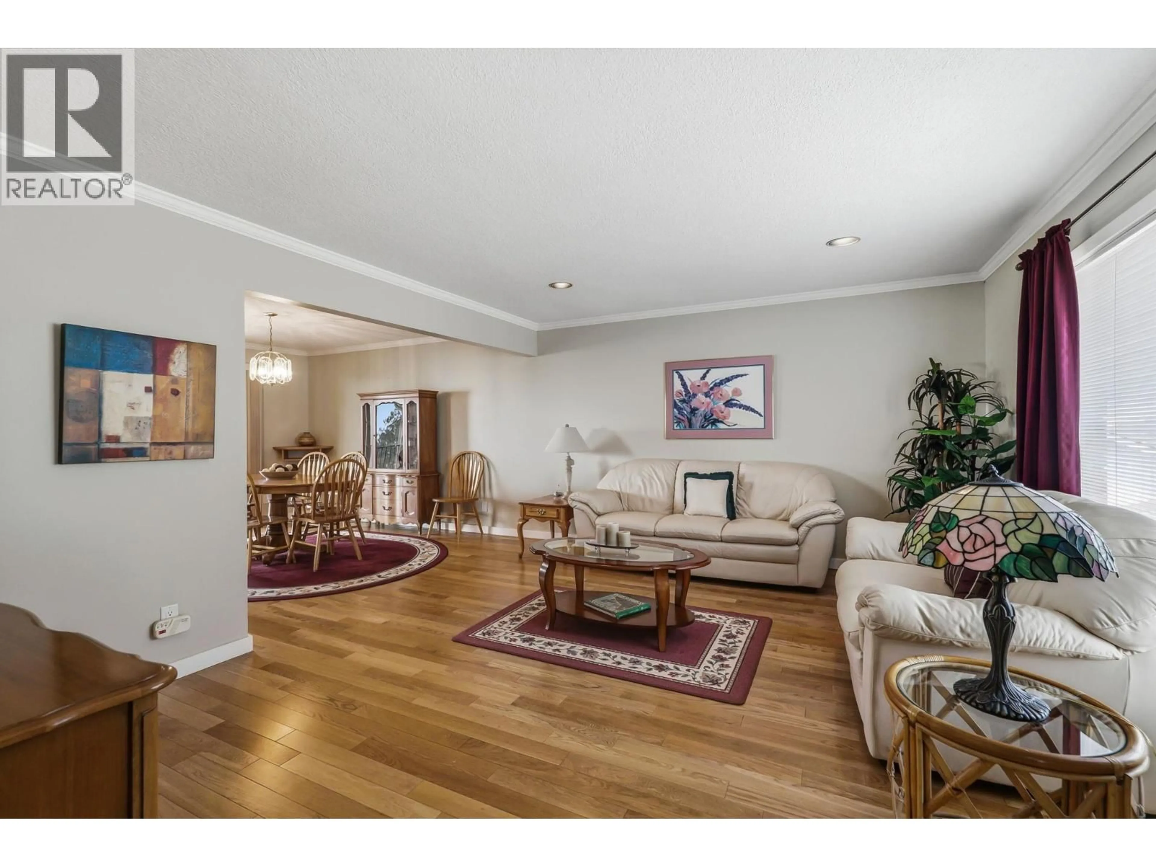 Living room with furniture, wood/laminate floor for 3213 SUNDANCE DRIVE, West Kelowna British Columbia V4T1S4
