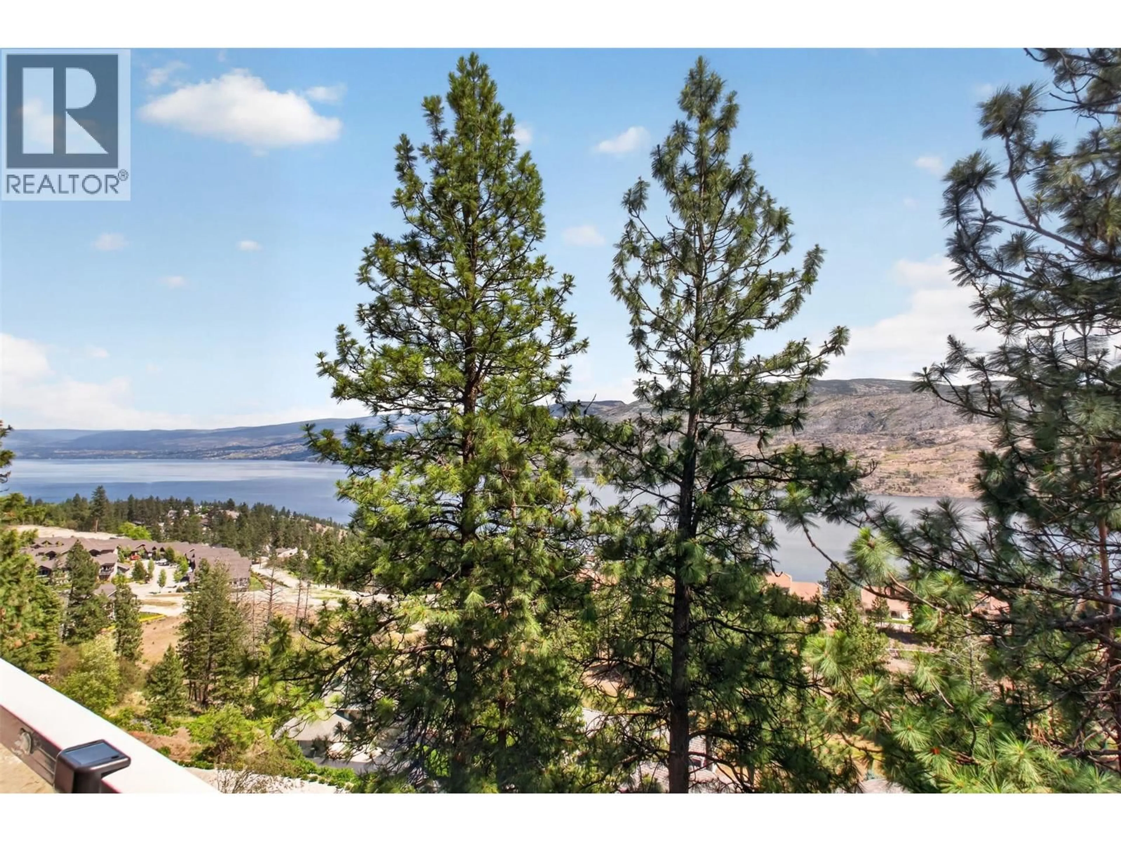 A pic from outside/outdoor area/front of a property/back of a property/a pic from drone, water/lake/river/ocean view for 308 - 4630 PONDEROSA DRIVE, Peachland British Columbia V0X1H5