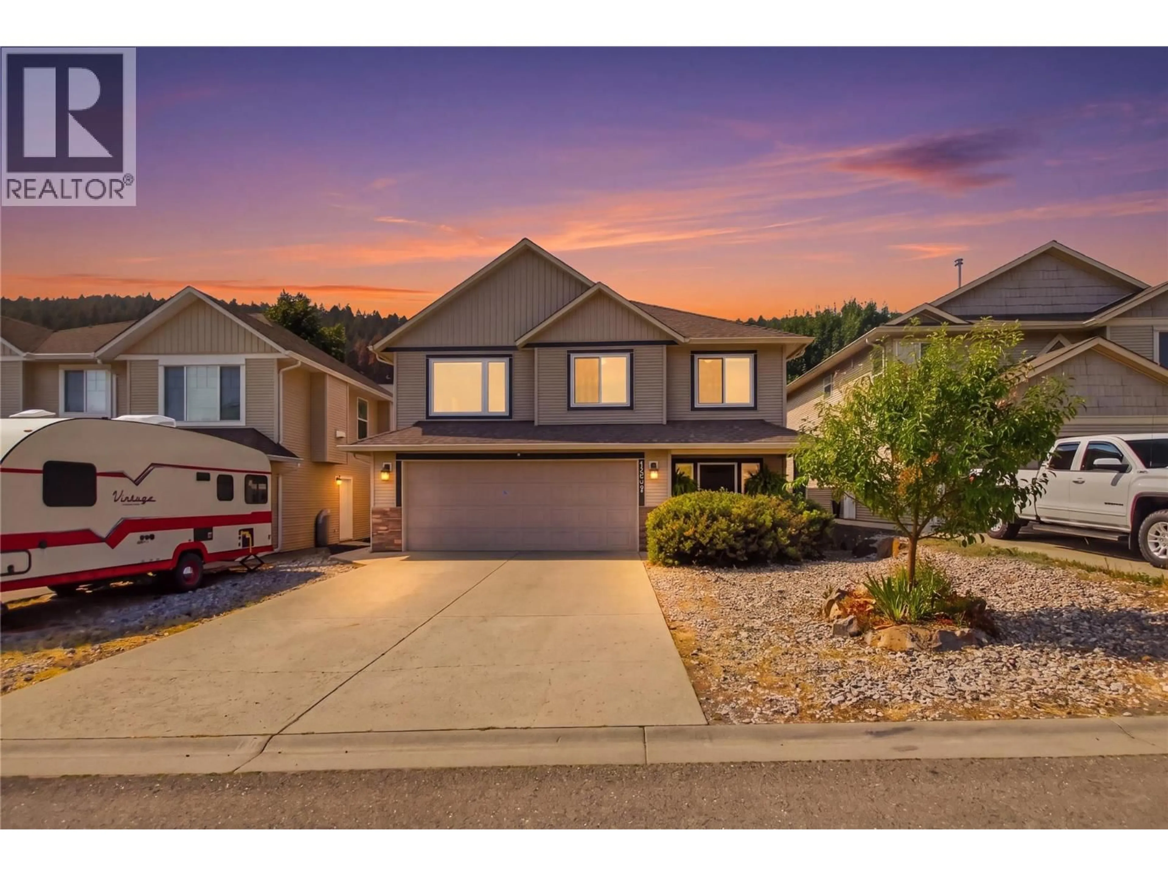 A pic from outside/outdoor area/front of a property/back of a property/a pic from drone, street for 1907 SNOWBERRY CRESCENT, Kamloops British Columbia V1S1Z8