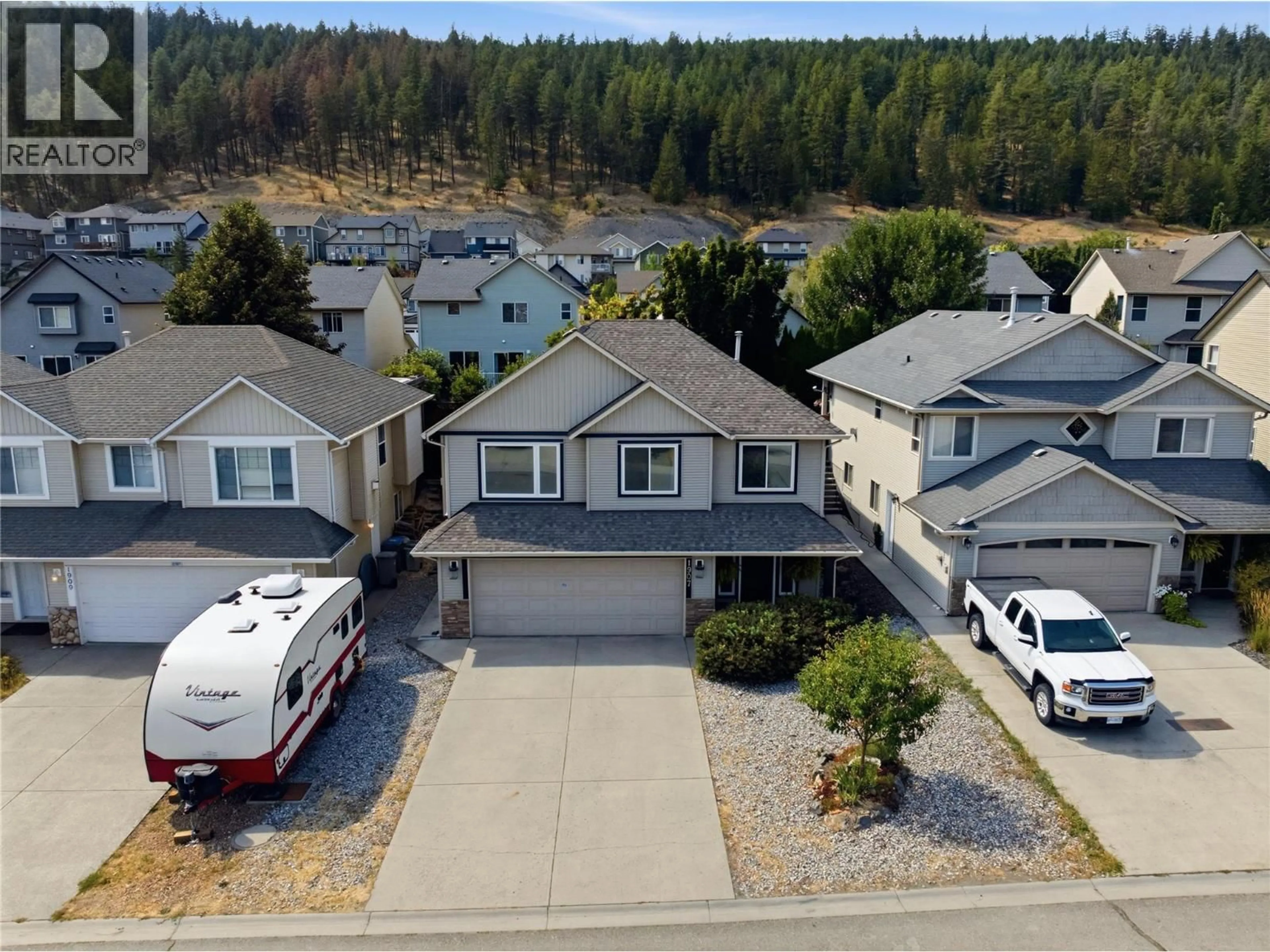 A pic from outside/outdoor area/front of a property/back of a property/a pic from drone, street for 1907 SNOWBERRY CRESCENT, Kamloops British Columbia V1S1Z8
