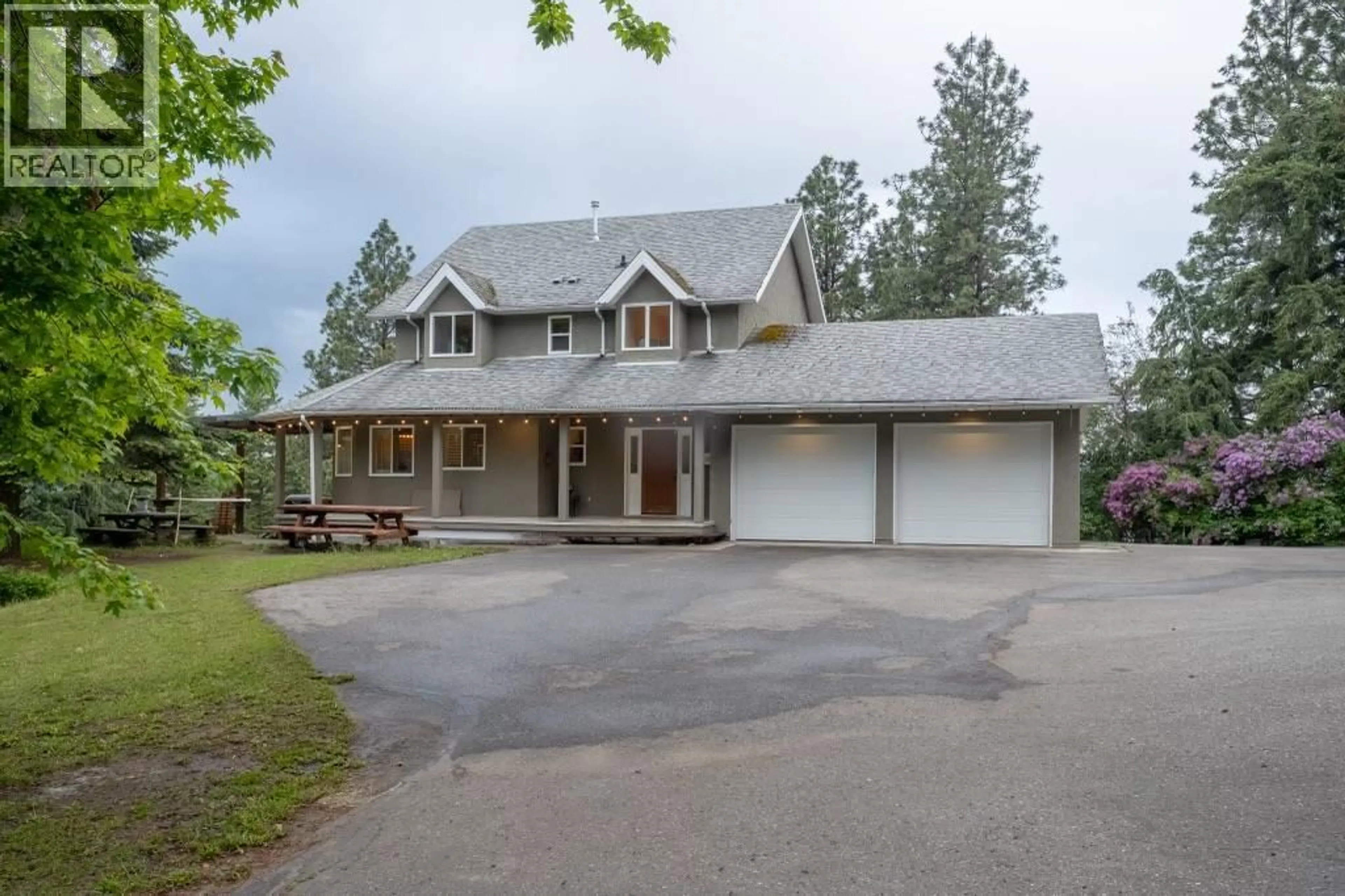 Home with vinyl exterior material, street for 5700 RANCH ROAD, Vernon British Columbia V1B3J9