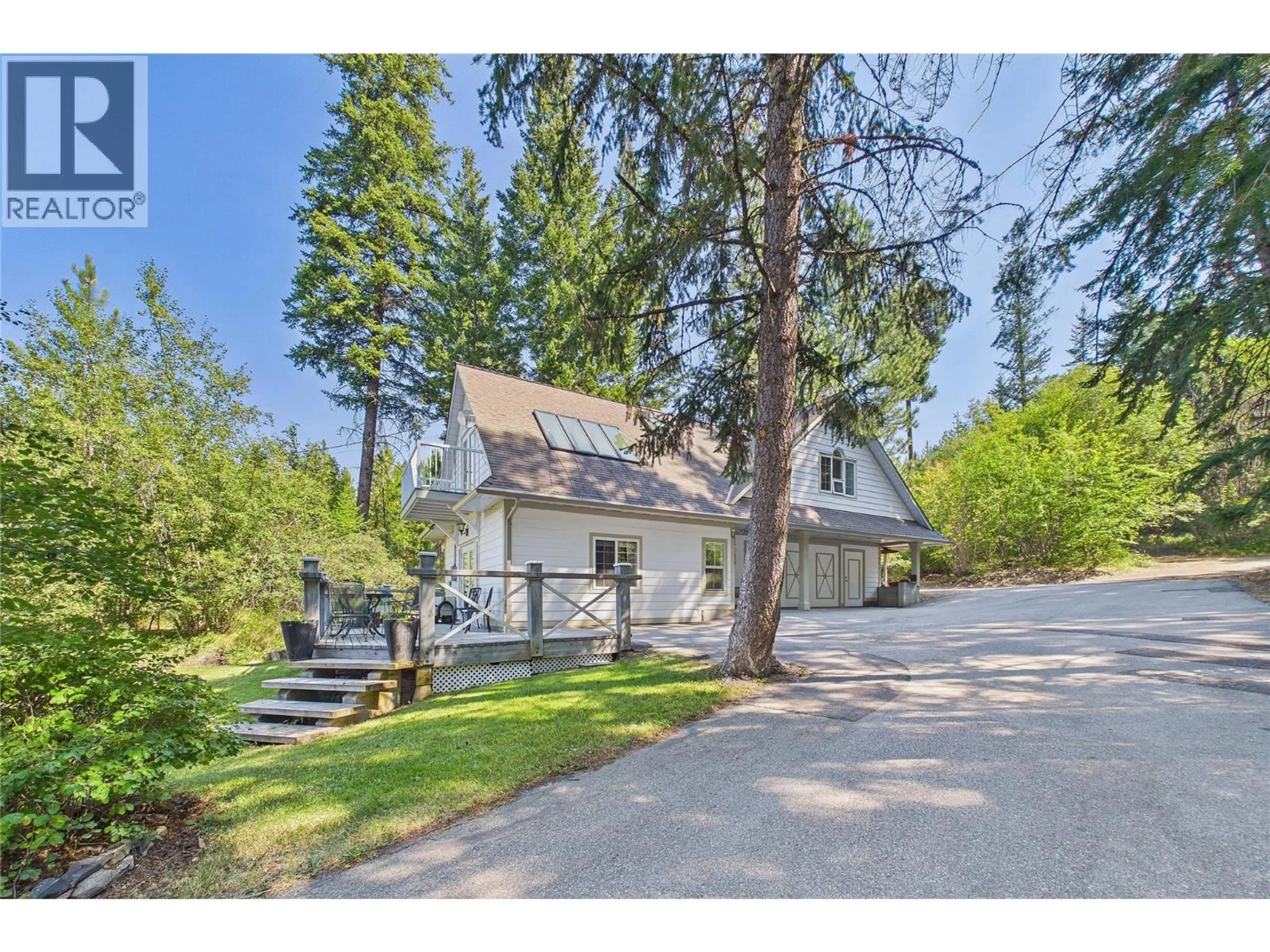 A pic from outside/outdoor area/front of a property/back of a property/a pic from drone, street for 114 BEAR END ROAD, Penticton British Columbia V2A8V6