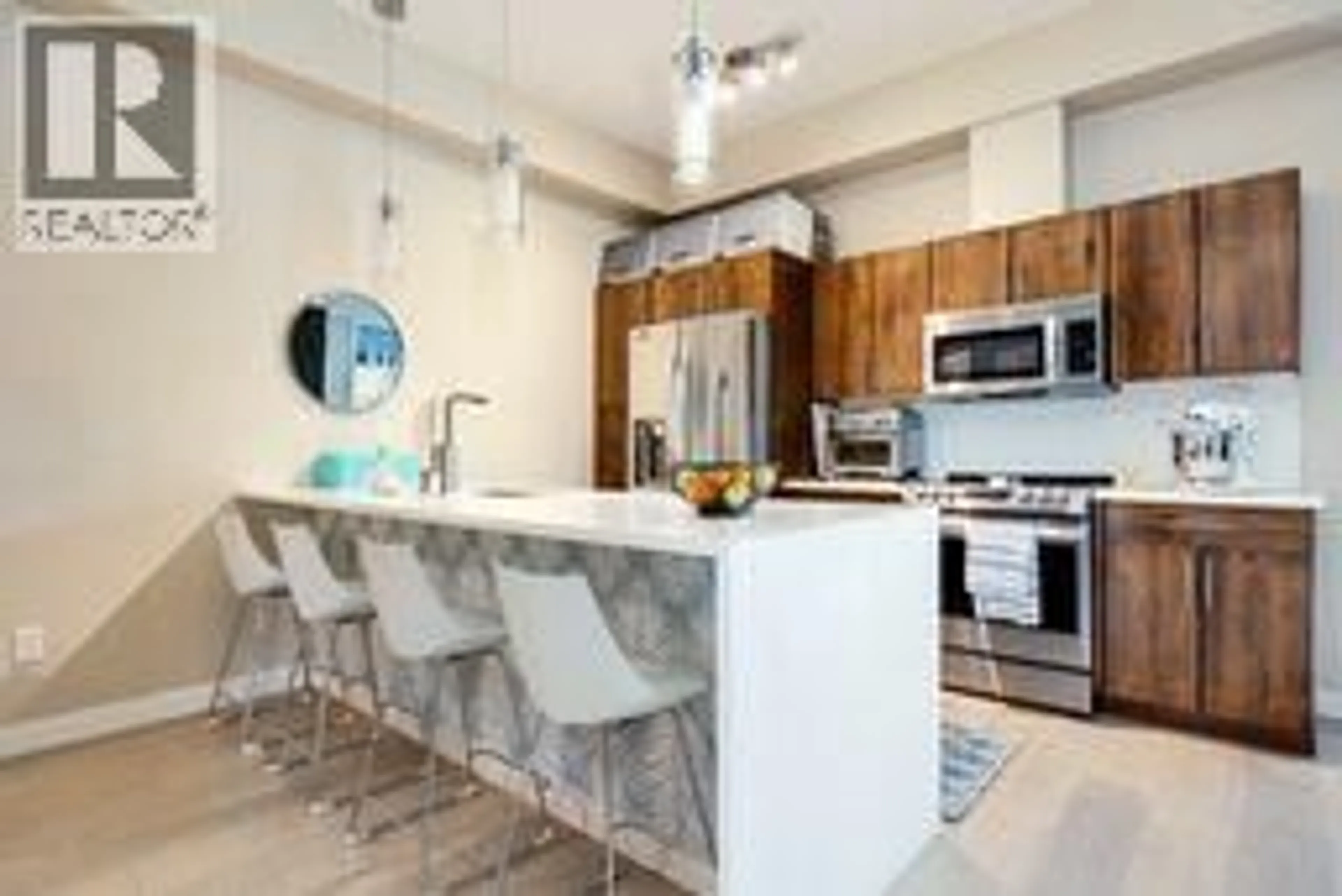 Open concept kitchen, unknown for 107 - 1331 ELLIS STREET, Kelowna British Columbia V1Y1Z9