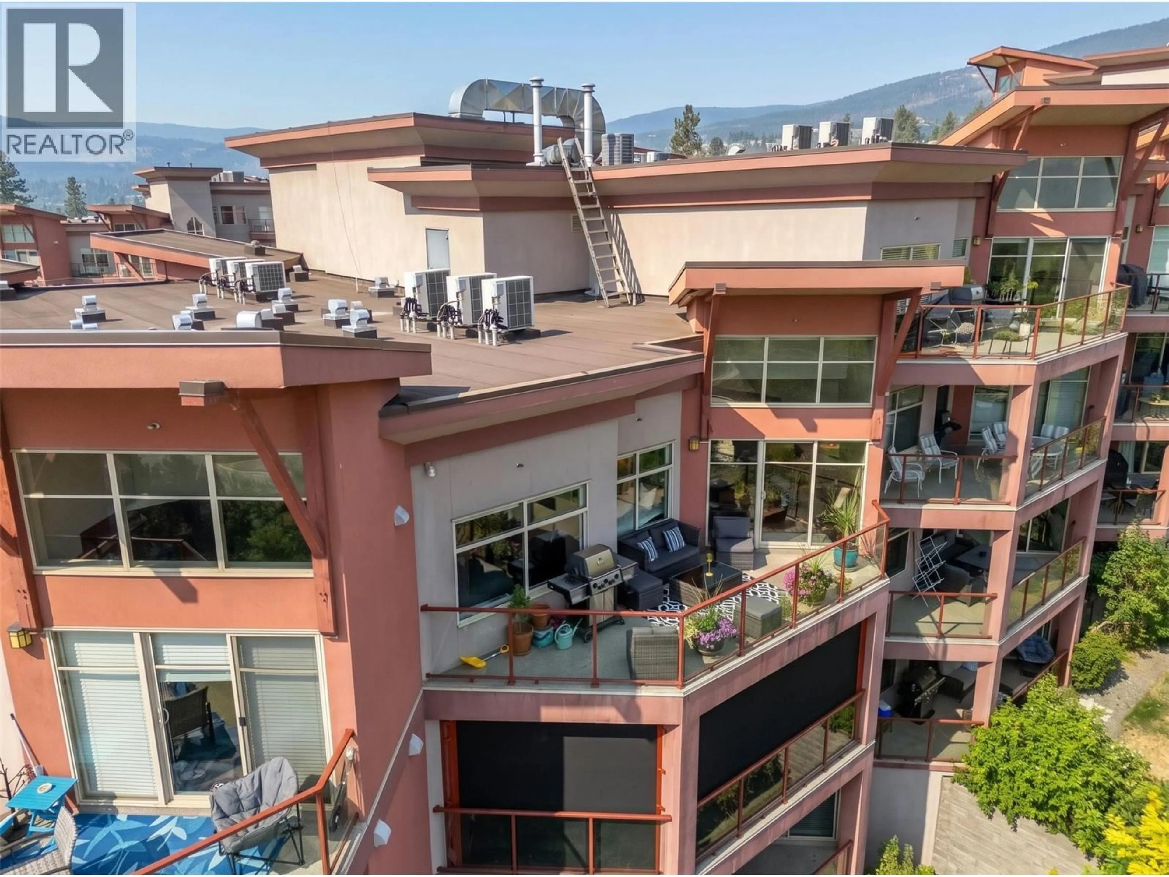 A pic from outside/outdoor area/front of a property/back of a property/a pic from drone, city buildings view from balcony for 406 - 3211 SKYVIEW LANE, West Kelowna British Columbia V4T3J3