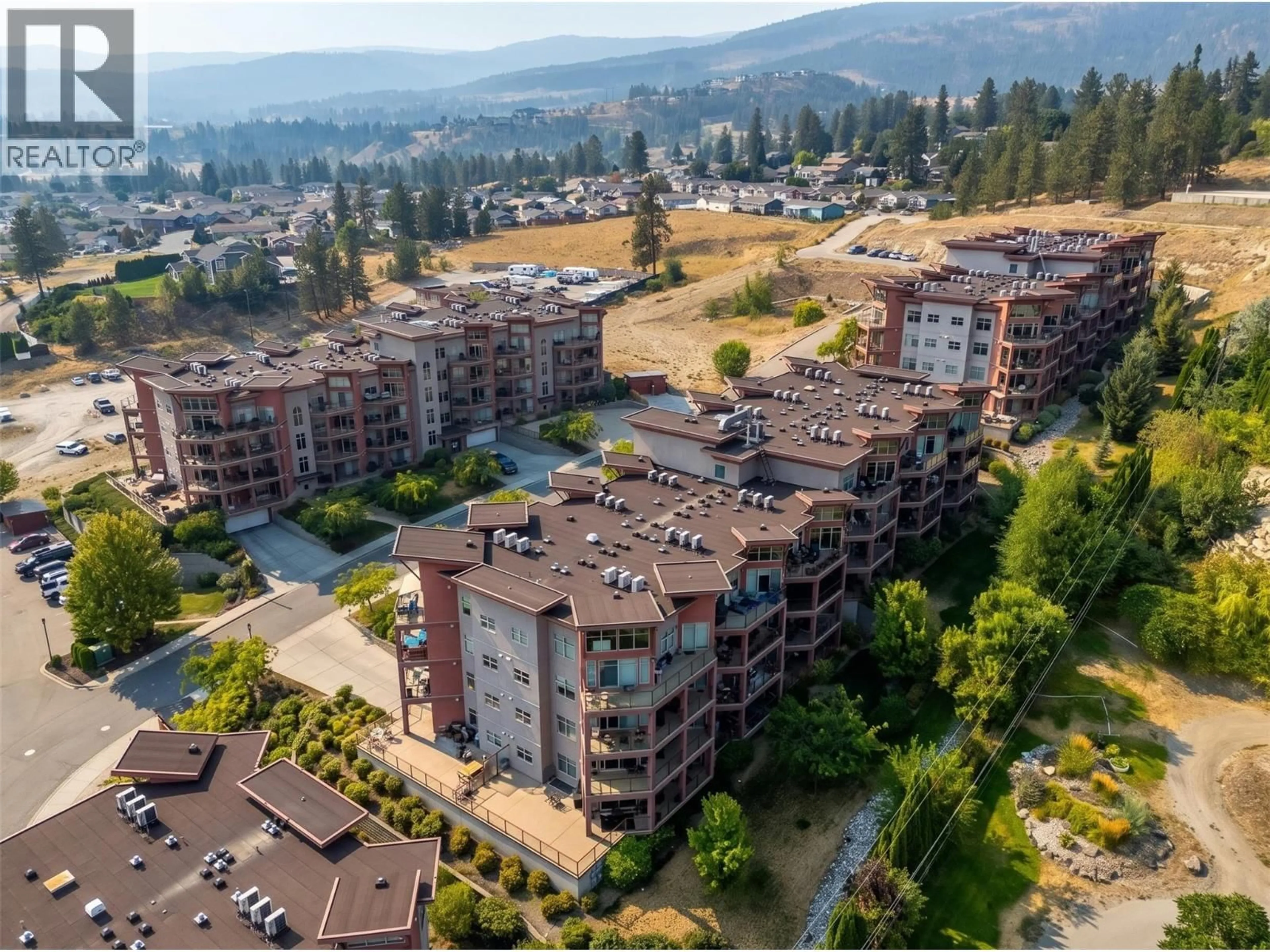 A pic from outside/outdoor area/front of a property/back of a property/a pic from drone, mountain view for 406 - 3211 SKYVIEW LANE, West Kelowna British Columbia V4T3J3