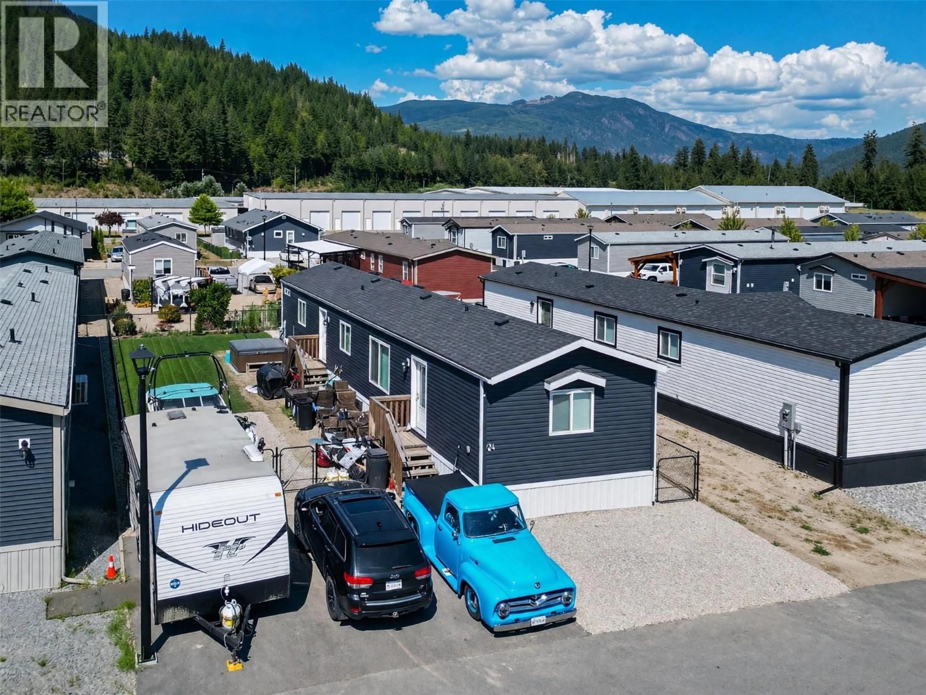 A pic from outside/outdoor area/front of a property/back of a property/a pic from drone, mountain view for 24 - 1705 HILLIER ROAD EAST, Sicamous British Columbia V0E2V4