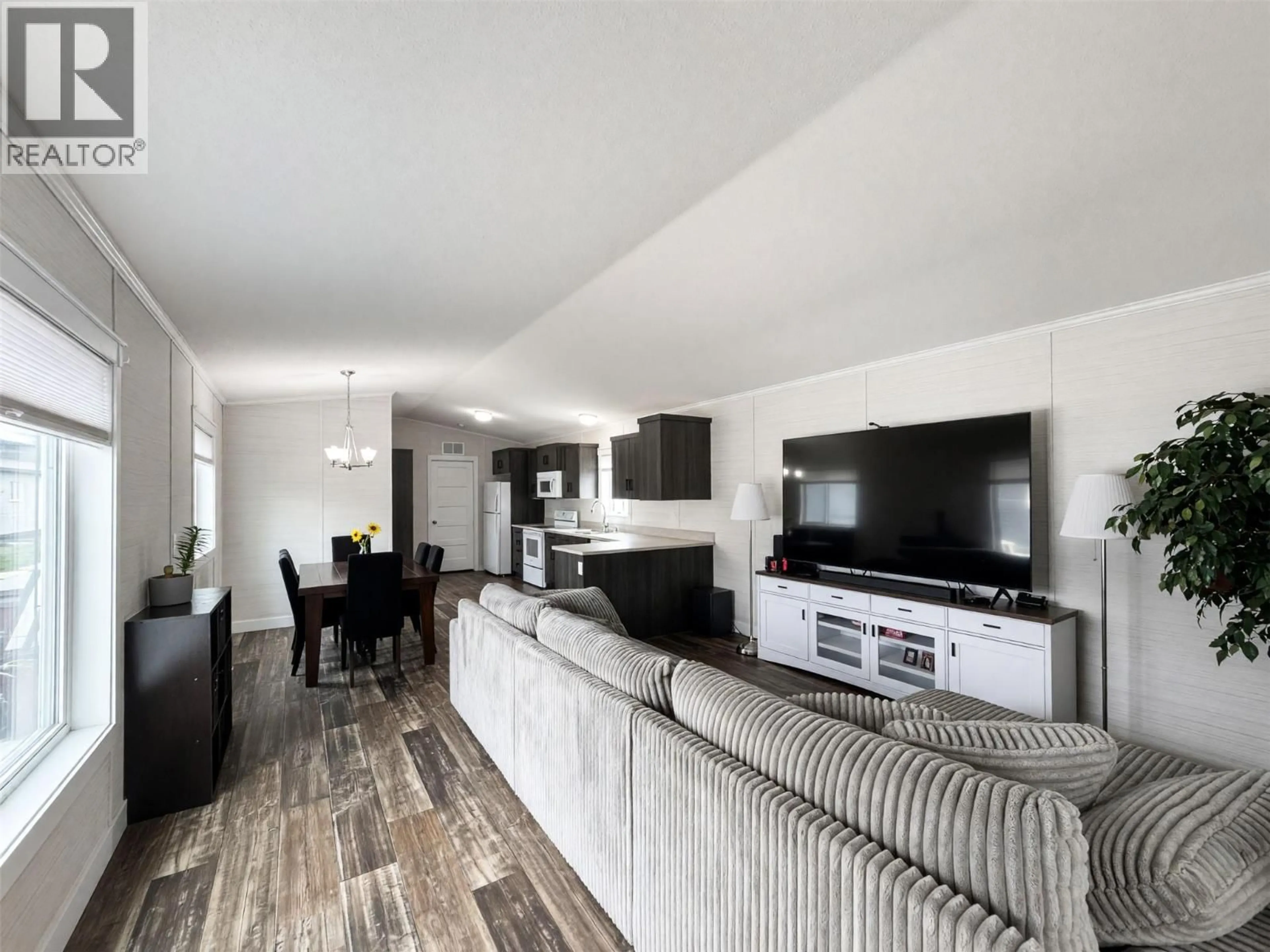 Living room with furniture, wood/laminate floor for 24 - 1705 HILLIER ROAD EAST, Sicamous British Columbia V0E2V4