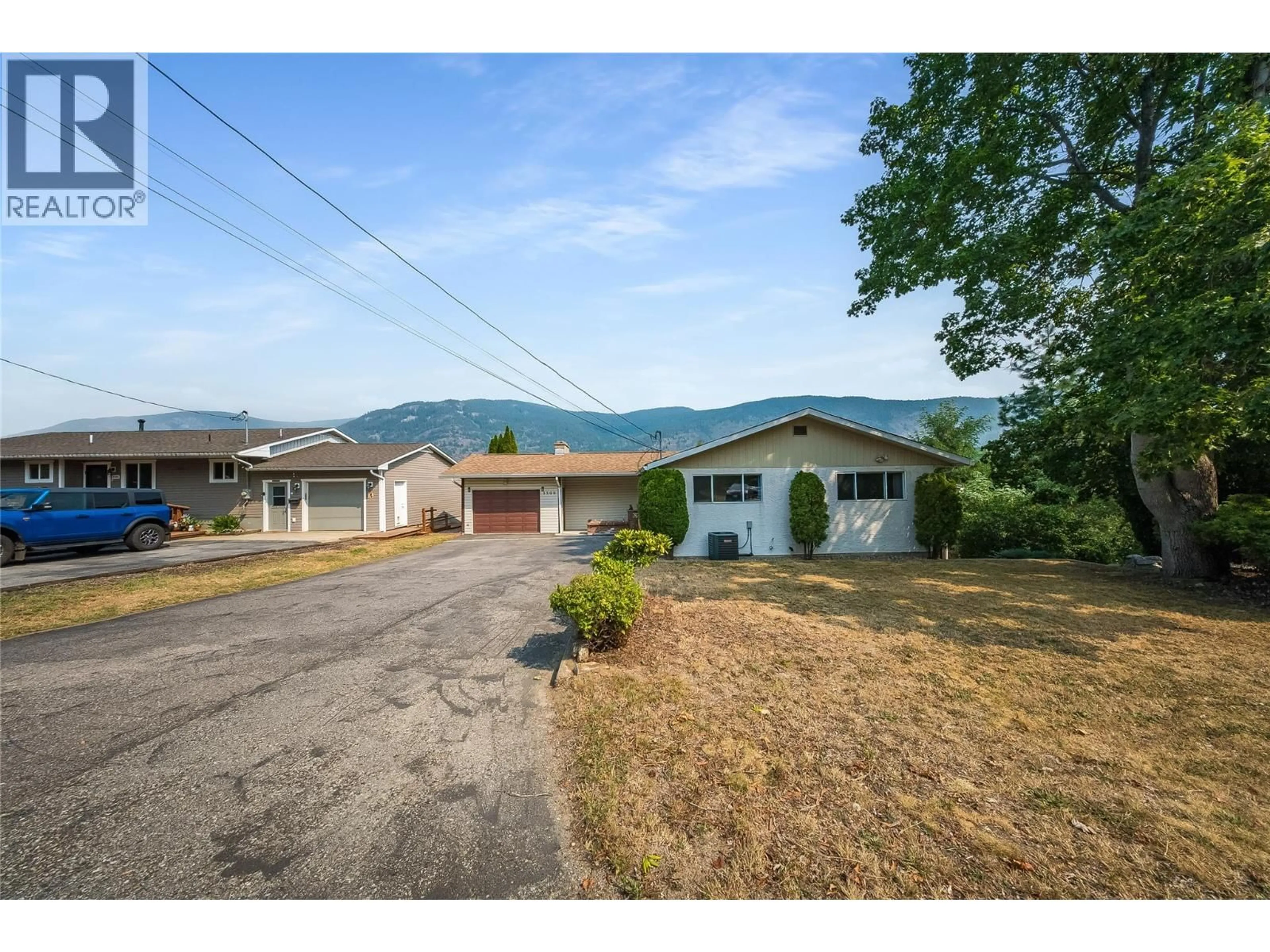 A pic from outside/outdoor area/front of a property/back of a property/a pic from drone, mountain view for 3509 5TH AVENUE, Castlegar British Columbia V1N2V8
