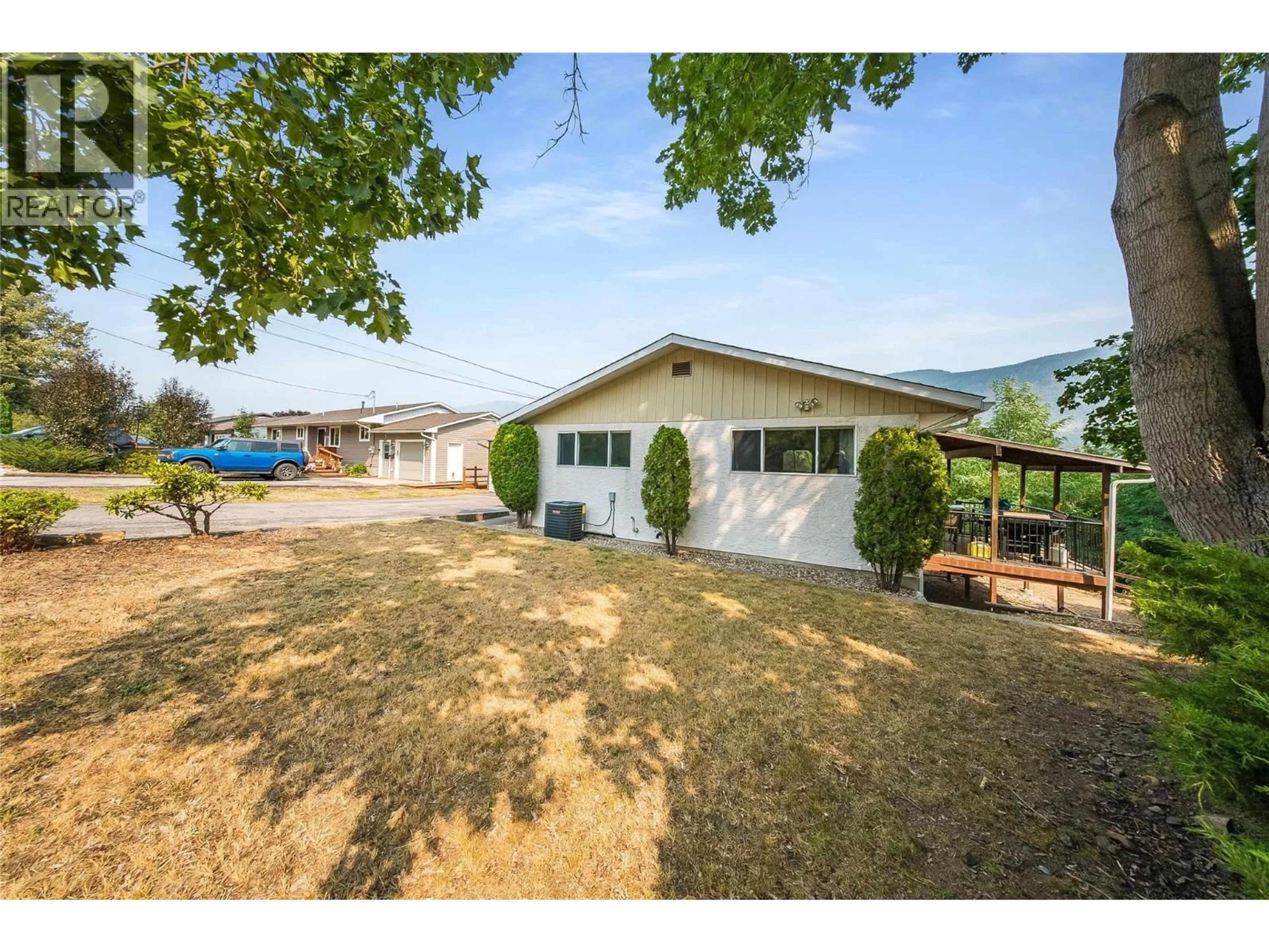 A pic from outside/outdoor area/front of a property/back of a property/a pic from drone, mountain view for 3509 5TH AVENUE, Castlegar British Columbia V1N2V8