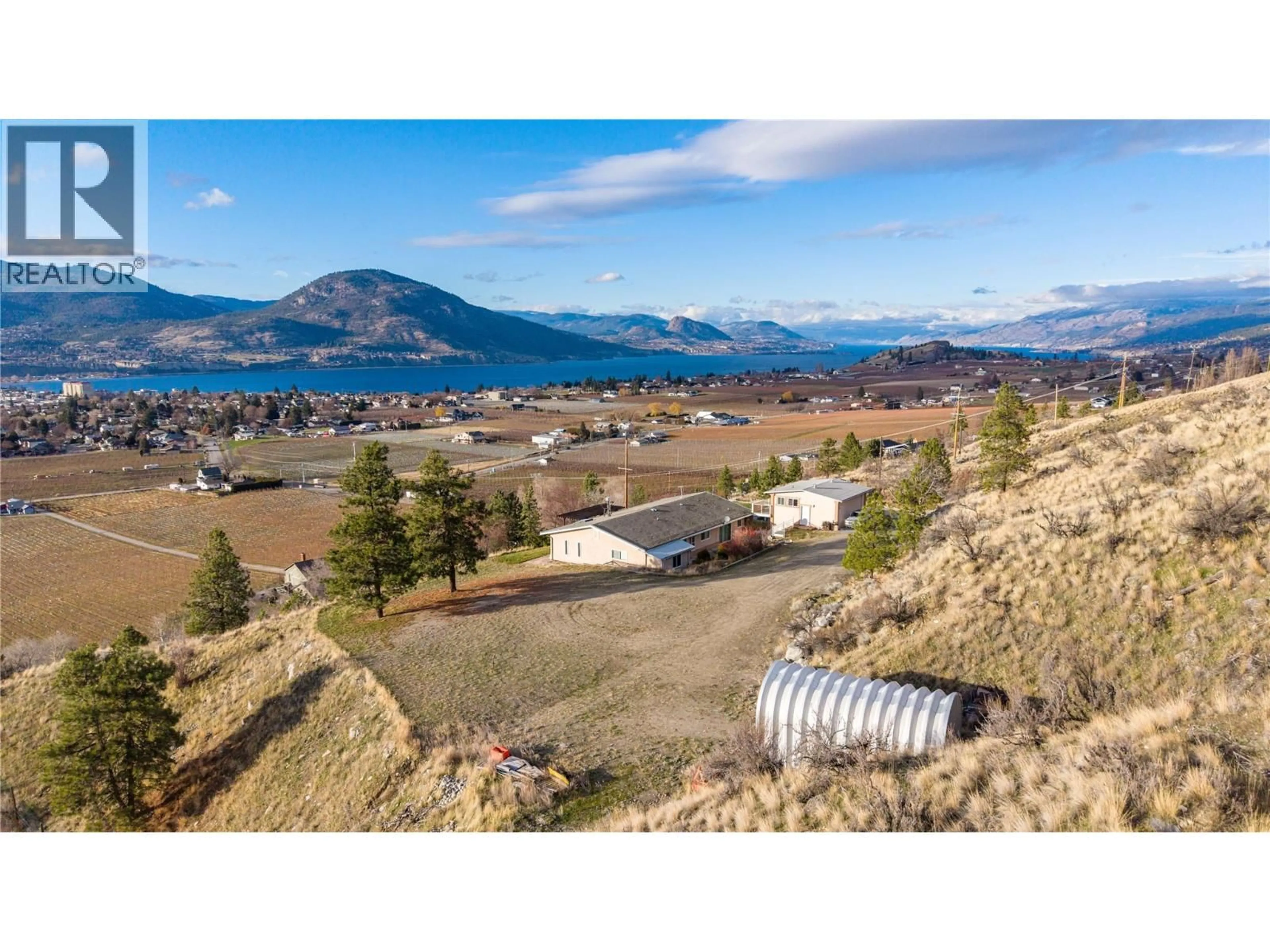 A pic from outside/outdoor area/front of a property/back of a property/a pic from drone, mountain view for 760 HUDSON STREET, Penticton British Columbia V2A8S9