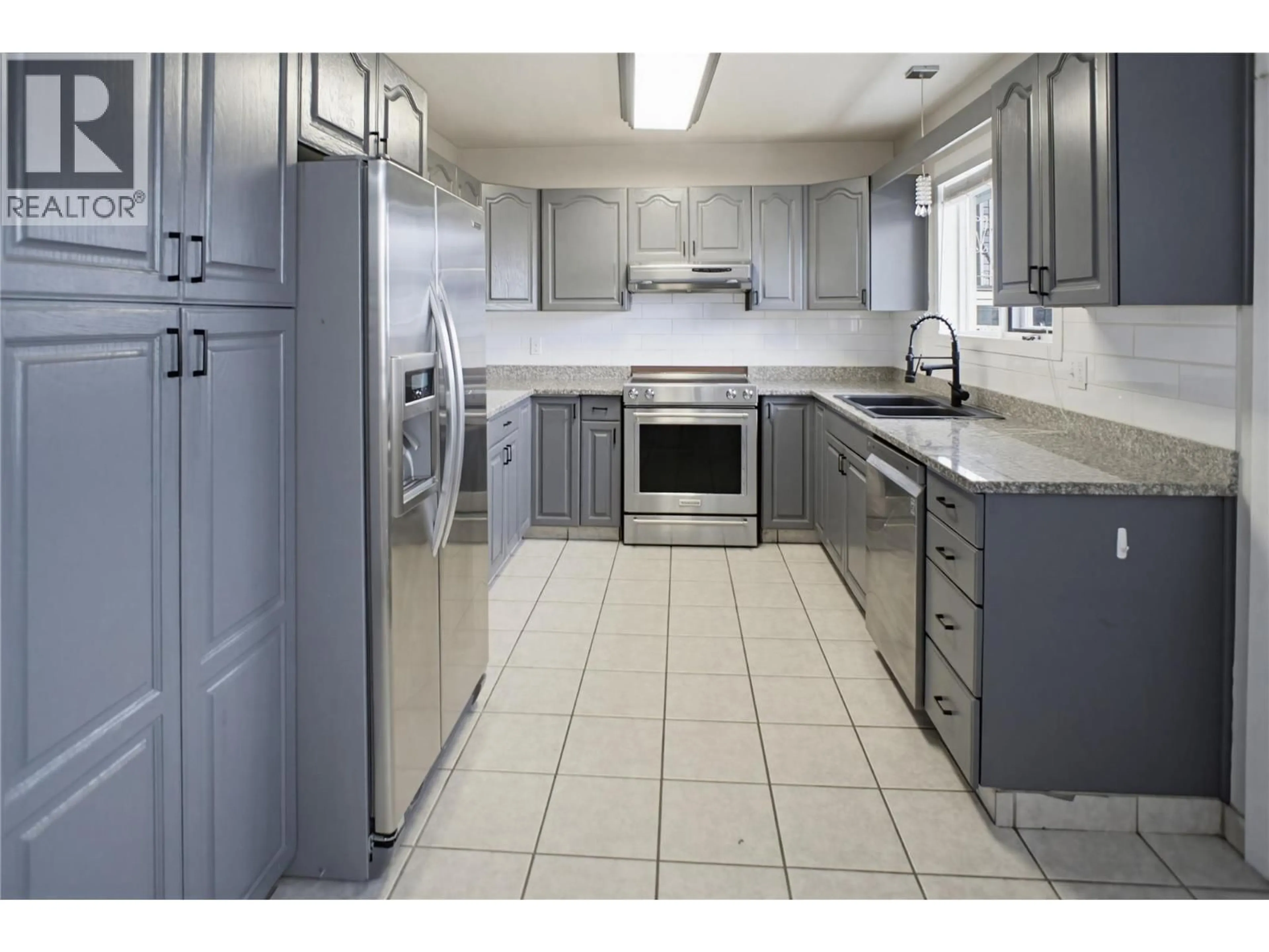 Standard kitchen, ceramic/tile floor for 1133 13TH STREET, Kamloops British Columbia V2B8K4