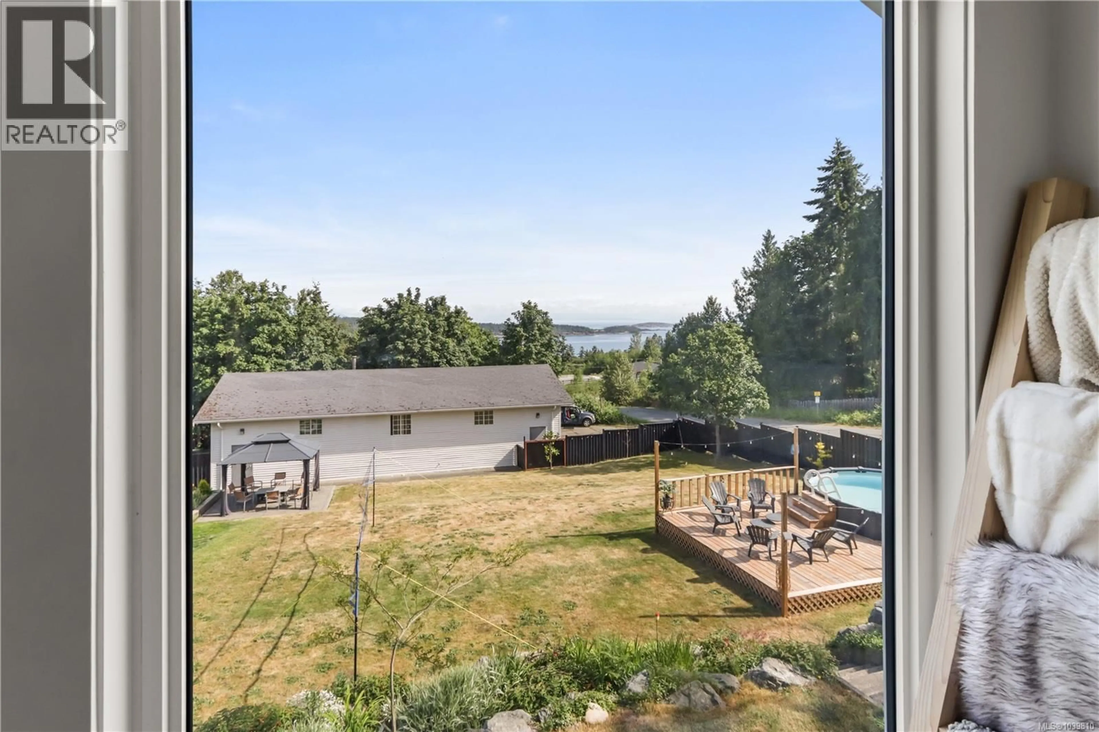 A pic from outside/outdoor area/front of a property/back of a property/a pic from drone, water/lake/river/ocean view for 8050 NORTHWIND DRIVE, Lantzville British Columbia V0R2H0