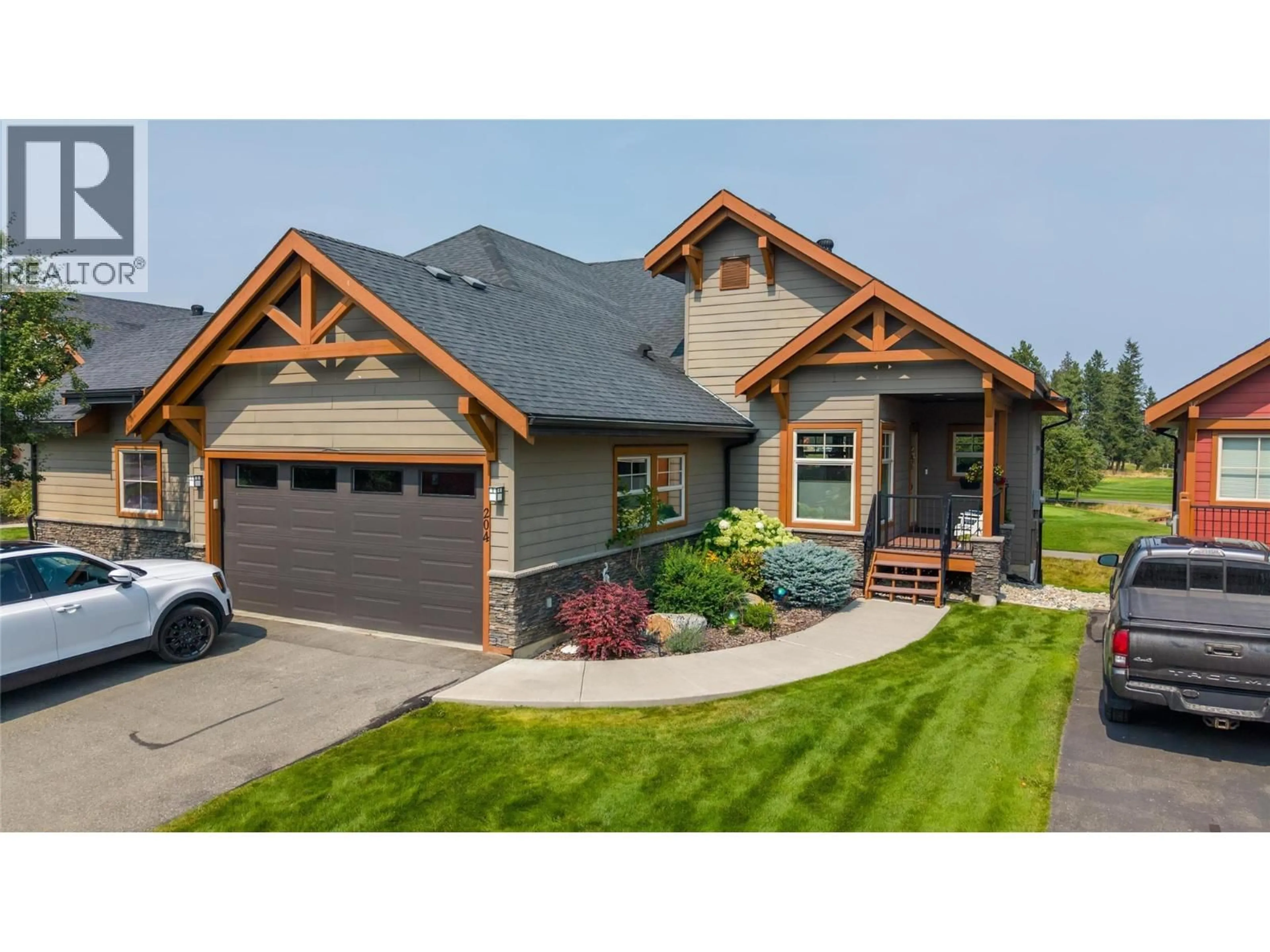 Home with vinyl exterior material, street for 204 BOULDER CREEK DRIVE, Cranbrook British Columbia V1C0B4
