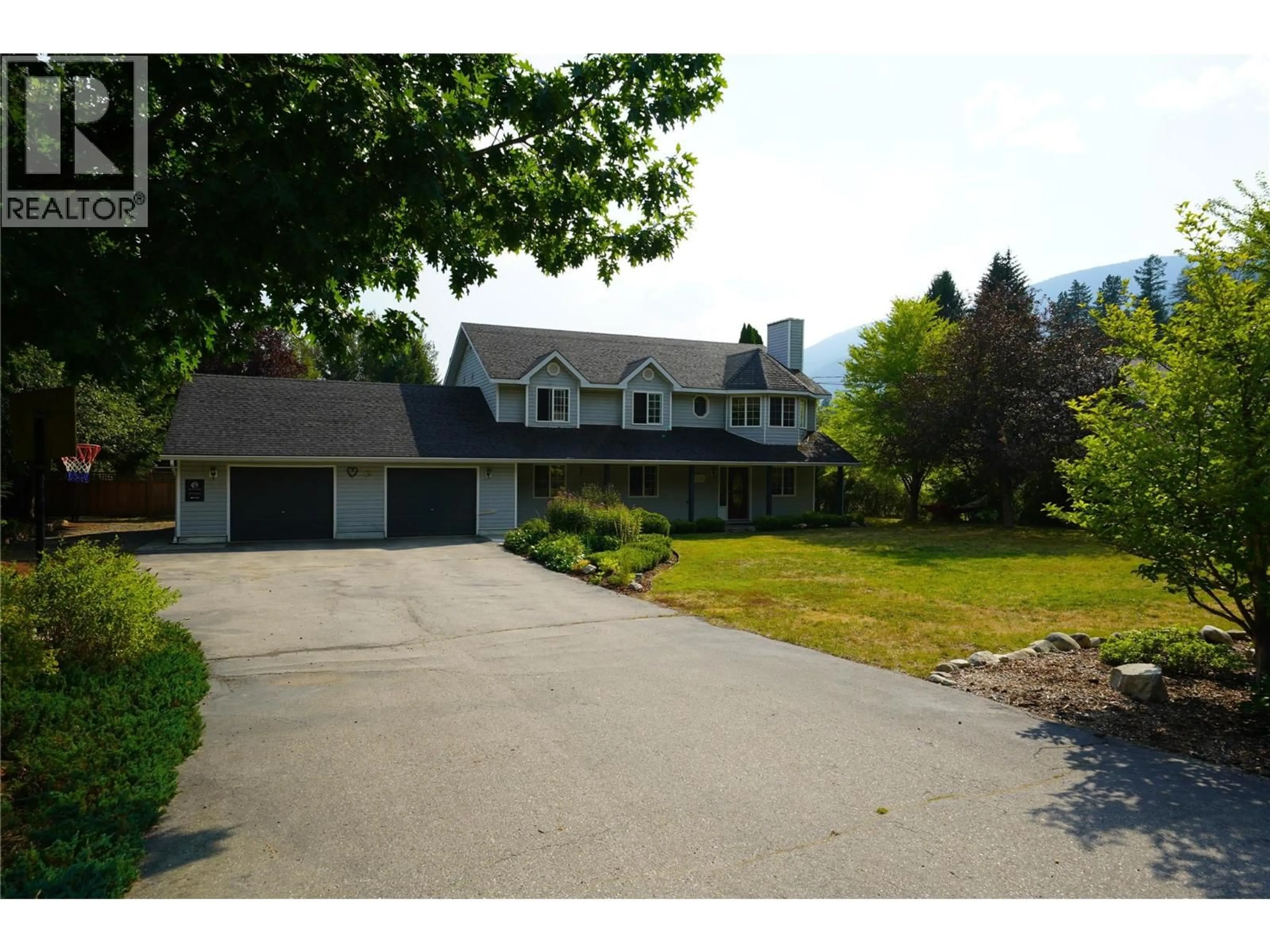 A pic from outside/outdoor area/front of a property/back of a property/a pic from drone, street for 2774 WAITE ROAD, Nelson British Columbia V1L6K9