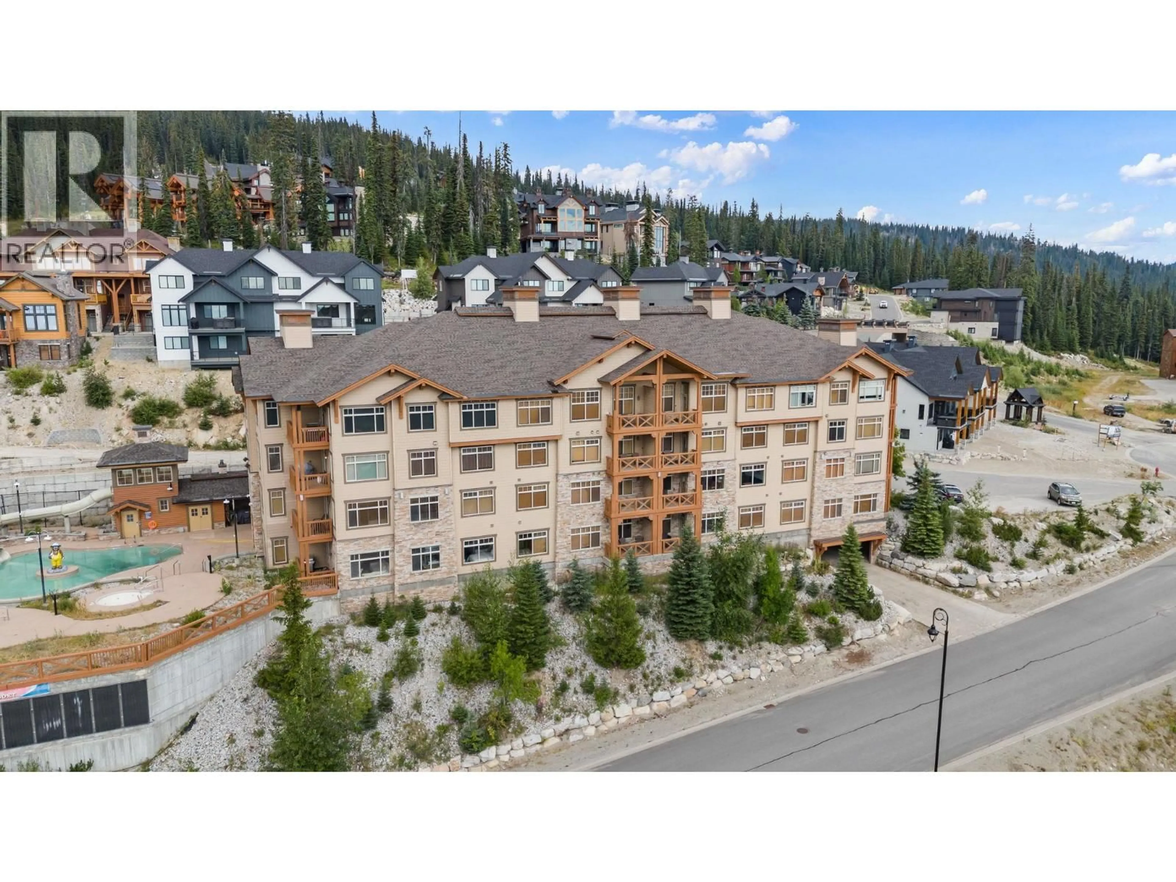 A pic from outside/outdoor area/front of a property/back of a property/a pic from drone, building for 207 - 255 FEATHERTOP WAY, Big White British Columbia V1P1T4