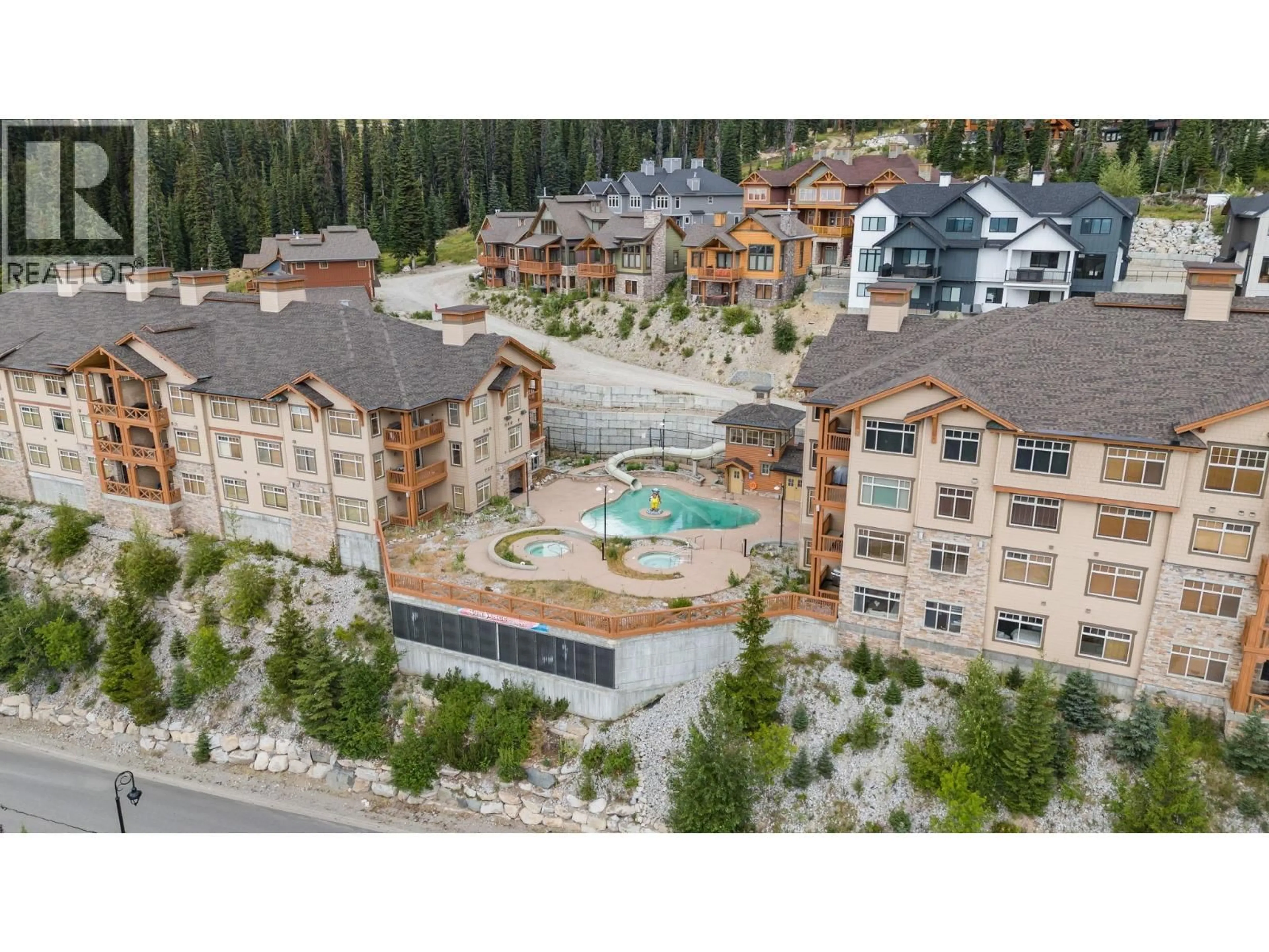 A pic from outside/outdoor area/front of a property/back of a property/a pic from drone, mountain view for 207 - 255 FEATHERTOP WAY, Big White British Columbia V1P1T4
