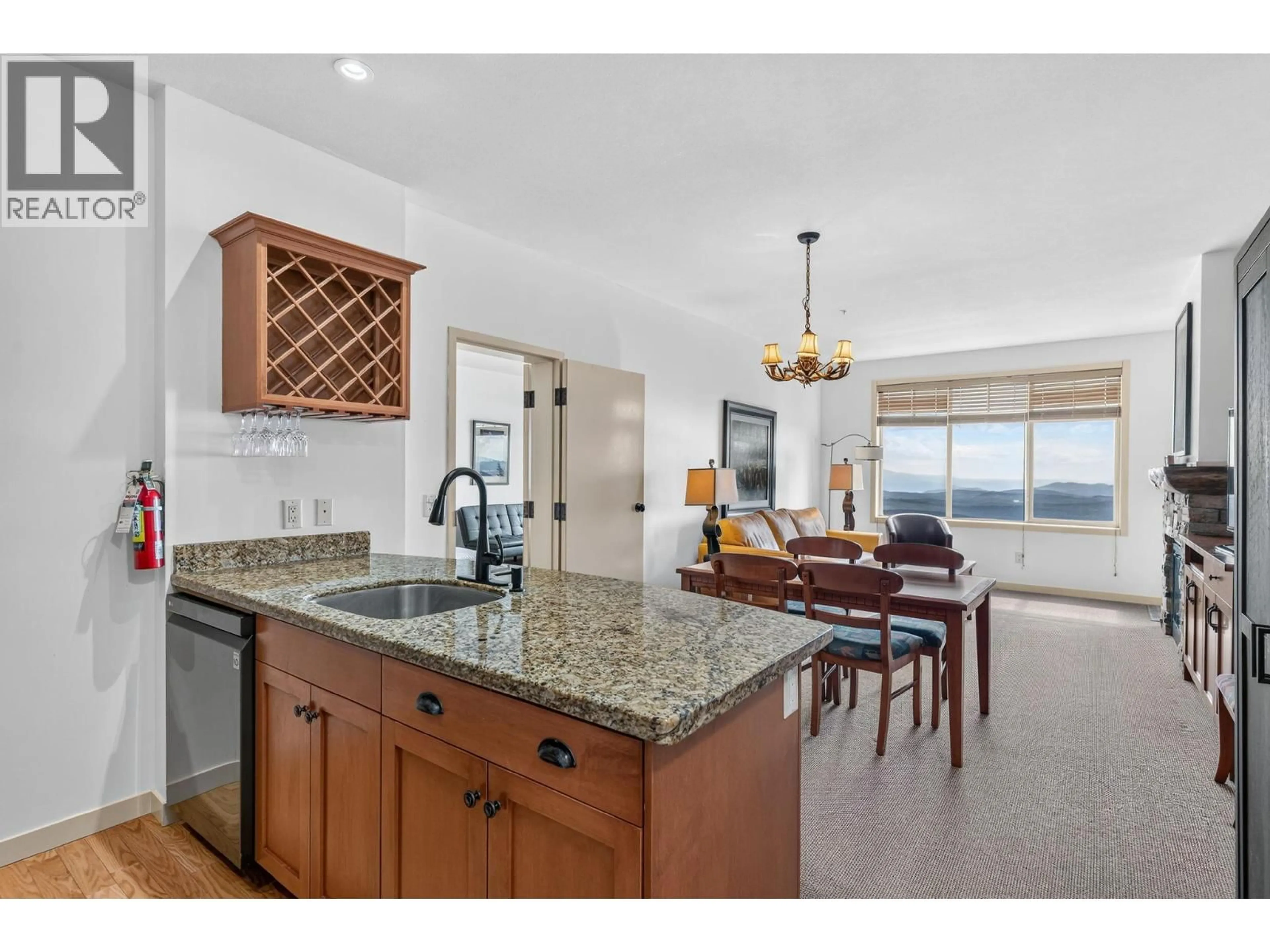 Open concept kitchen, ceramic/tile floor for 207 - 255 FEATHERTOP WAY, Big White British Columbia V1P1T4