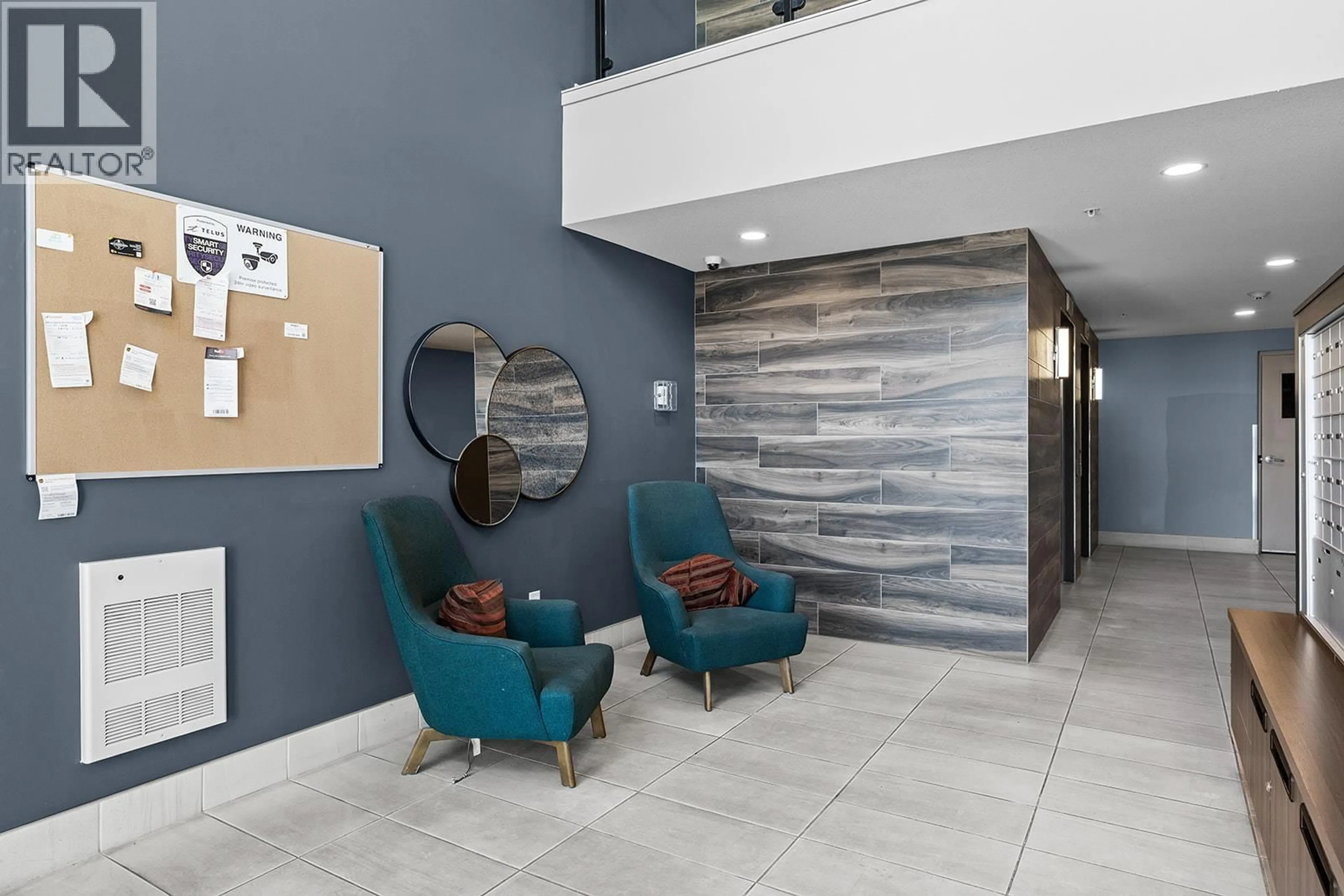 Indoor foyer for 203 - 625 ACADEMY WAY, Kelowna British Columbia V1V0E3